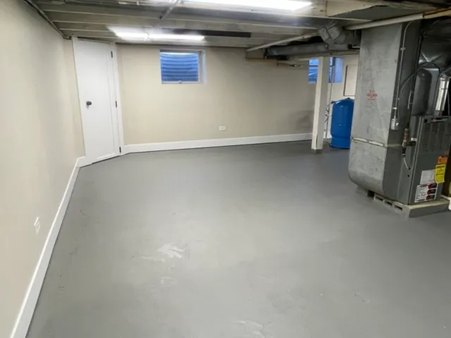 a view of backyard with seating space