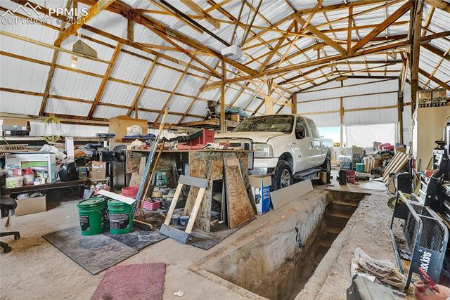 8155 North Log Road Peyton, CO 80831 - Photo 26 of 29 Massive Shop/Garage with oil pit