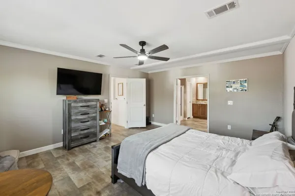 a bathroom with a granite countertop sink mirror and double