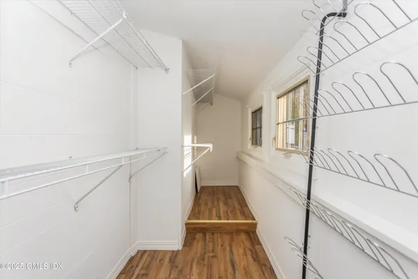 a view of entryway with wooden floor