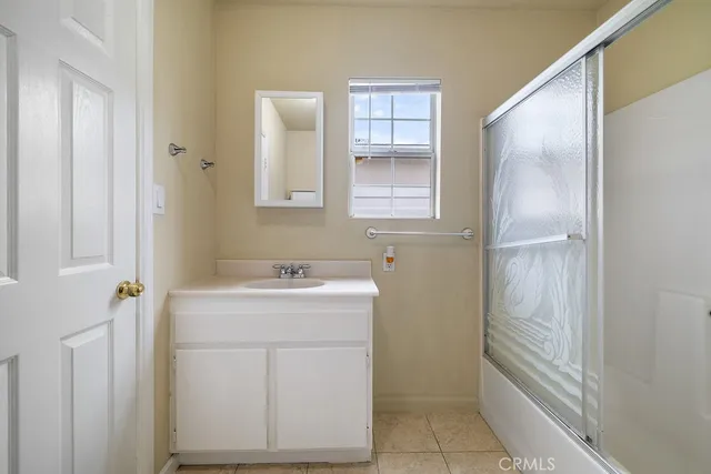 a bathroom with a sink toilet and vanity