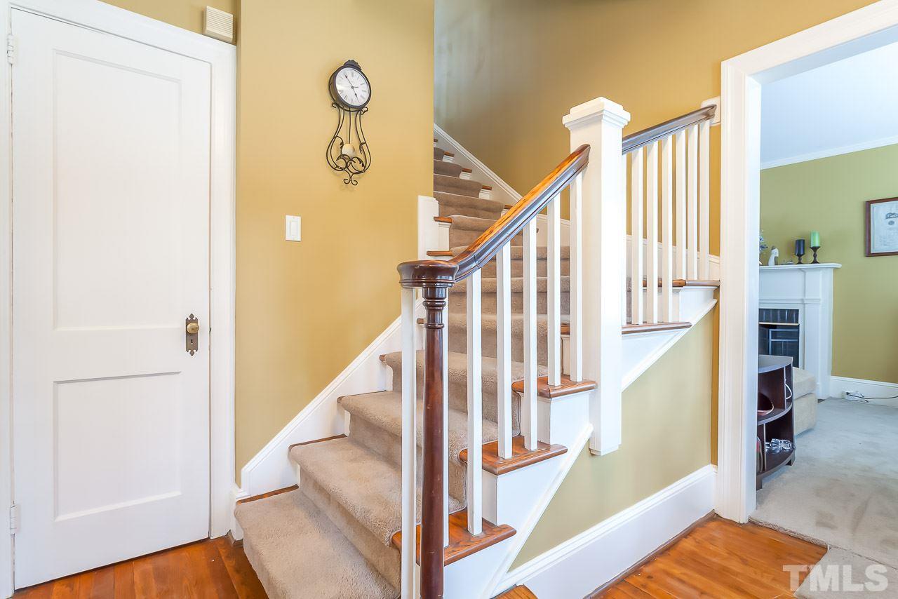 2518 Beechridge Road Raleigh, NC 27608 - Photo 11 of 25 a view of entryway and hall with wooden floor