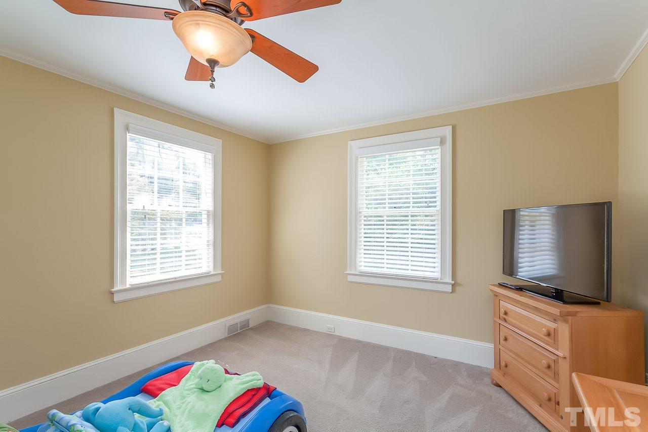 2518 Beechridge Road Raleigh, NC 27608 - Photo 15 of 25 a livingroom with window