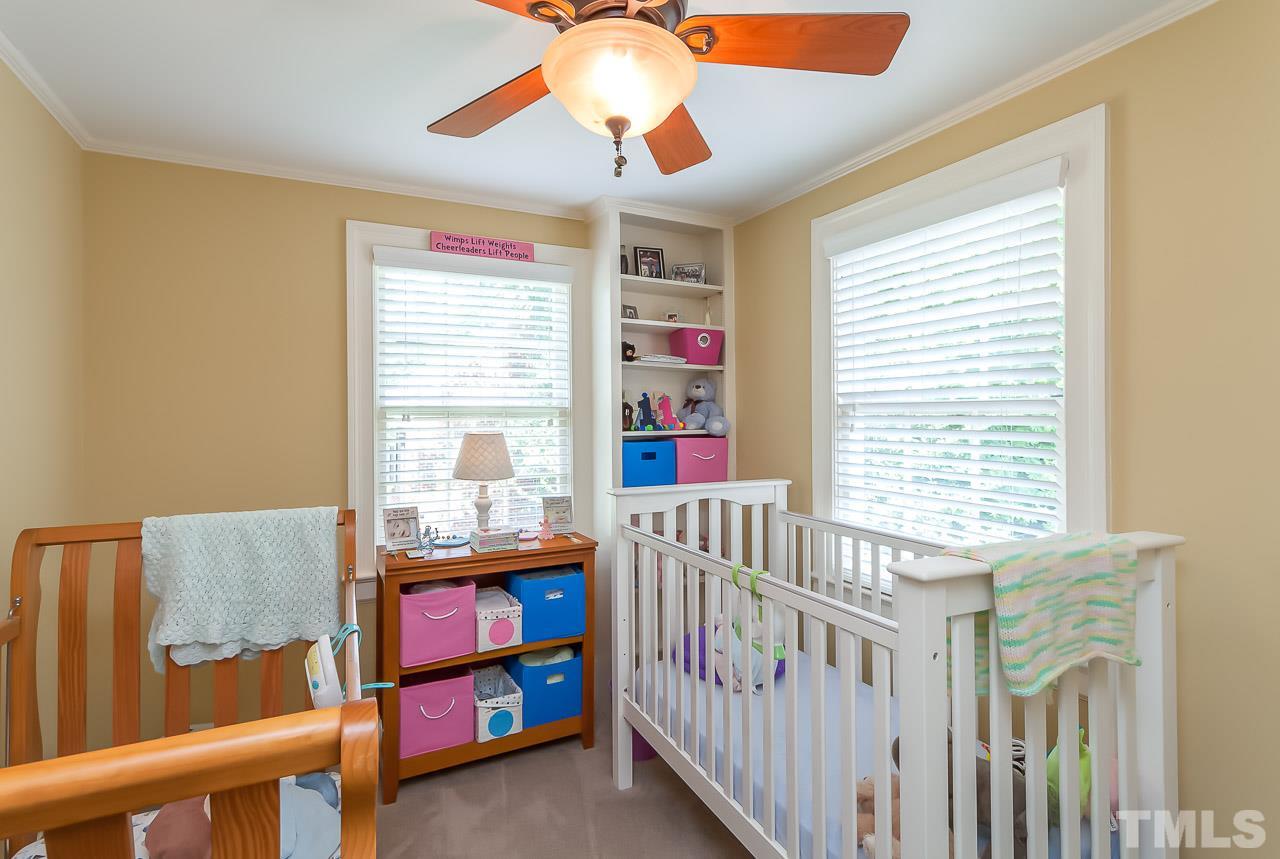 2518 Beechridge Road Raleigh, NC 27608 - Photo 16 of 25 a view of a room with furniture and window