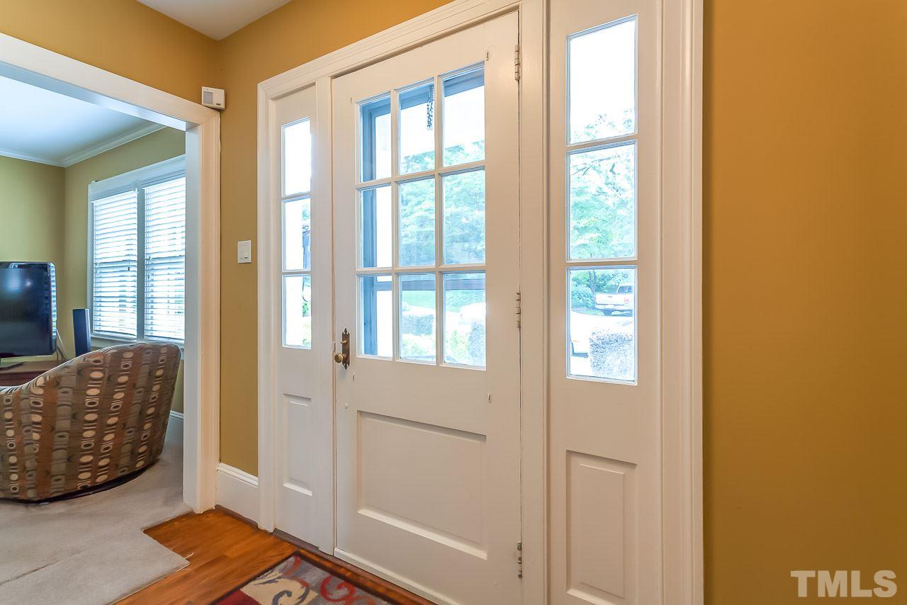 2518 Beechridge Road Raleigh, NC 27608 - Photo 24 of 25 a living room with furniture and a window