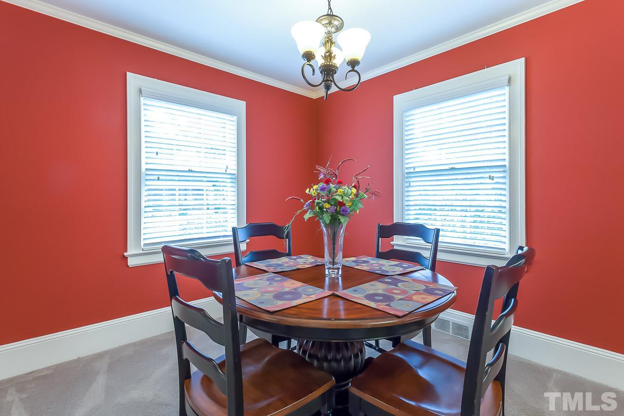 2518 Beechridge Road Raleigh, NC 27608 - Photo 4 of 25 a dining room with furniture and window