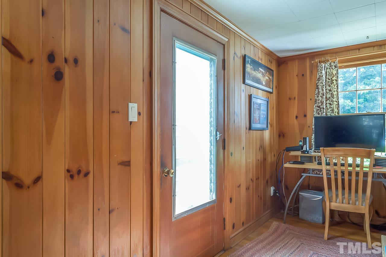 2518 Beechridge Road Raleigh, NC 27608 - Photo 10 of 25 a workspace room with furniture and a window