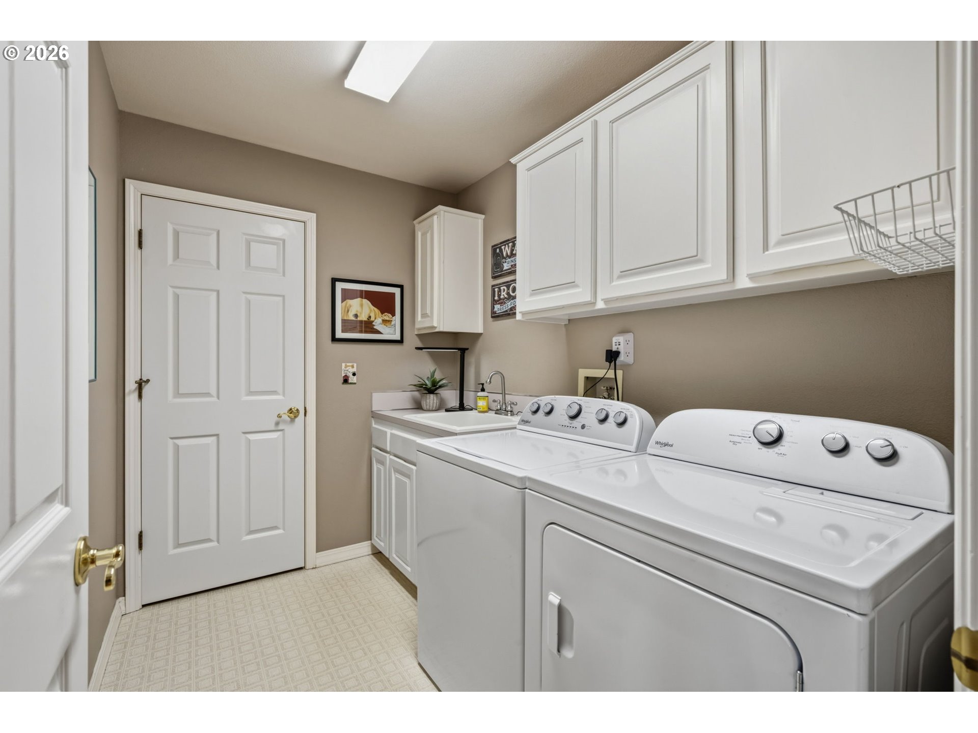 6108 Southwest Kruse Ridge Drive Portland, OR 97219 - Photo 16 of 42 a utility room with dryer and washer