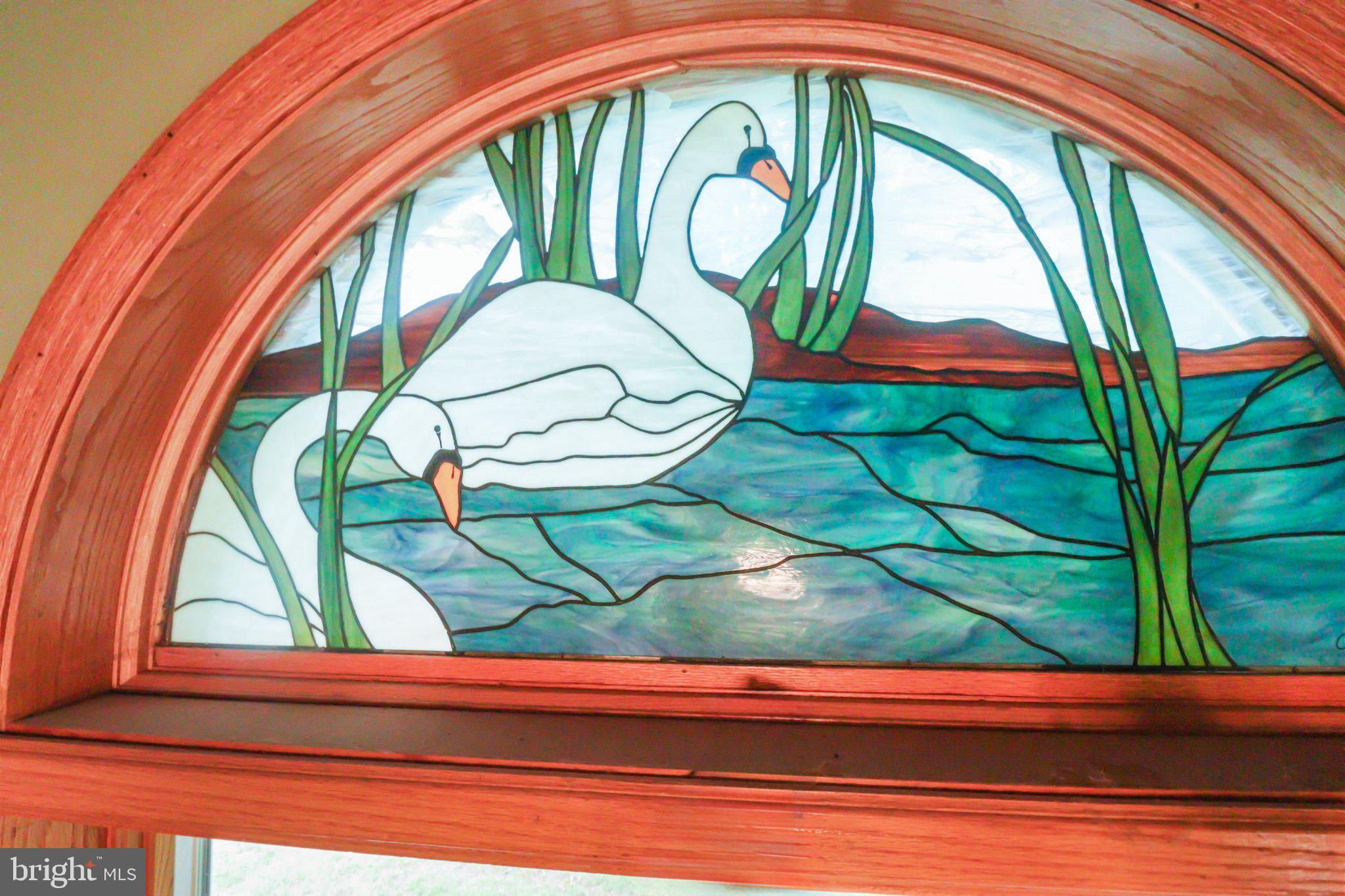 74 Cedar Road Pittsgrove, NJ 08318 - Photo 13 of 23 Elegant stained glass swans in nature.