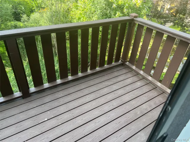 a kitchen with a stove a sink and a microwave