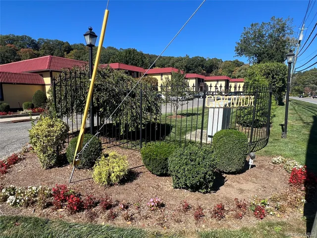 a view of a street with sitting area