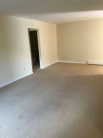 a view of a room with an empty space