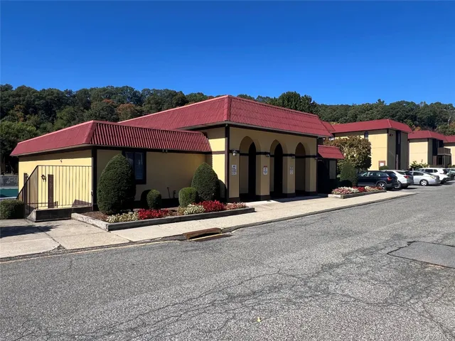 a view of a house with outdoor space and porch
