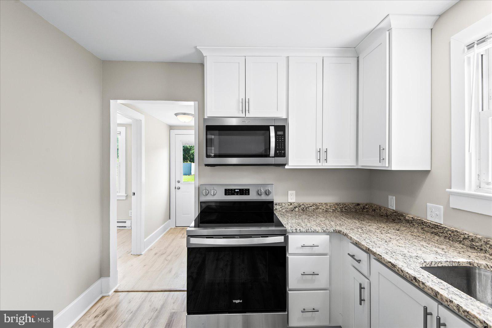 58 Longfield Road Colonial Beach, VA 22443 - Photo 18 of 31 Kitchen looking out at back door