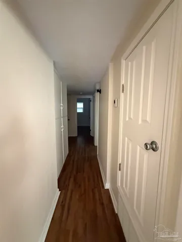 a view of a bathroom from the hallway