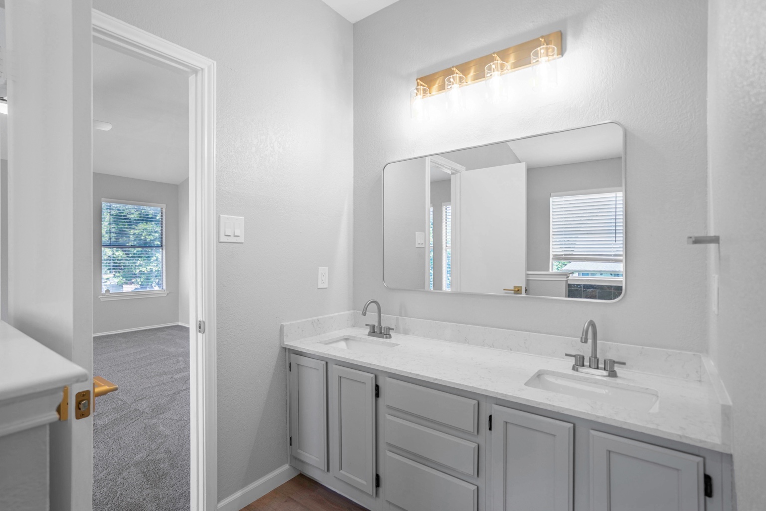 800 Smoke Signal Pass Pflugerville, TX 78660 - Photo 17 of 40 Double vanity in a primary bath provides ample counter space and dual functionality.