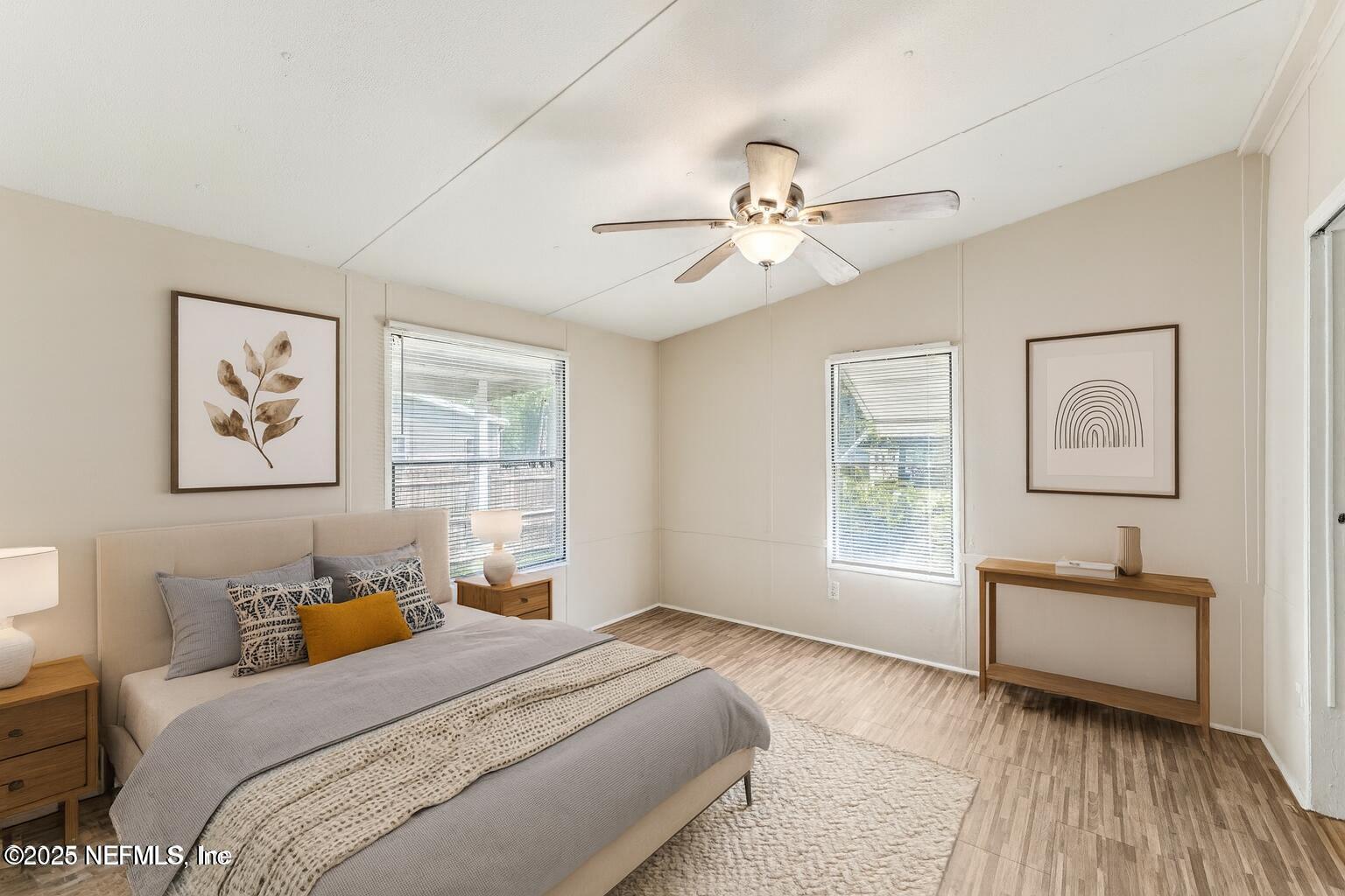 781 Hamilton Avenue St. Augustine, FL 32084 - Photo 17 of 39 a bedroom with furniture and a window