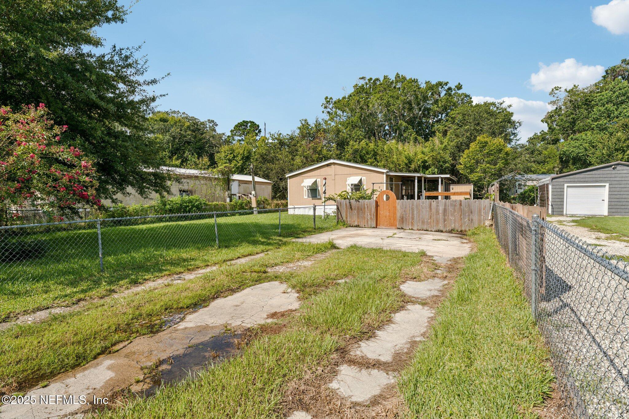781 Hamilton Avenue St. Augustine, FL 32084 - Photo 9 of 39 a view of house with a swimming pool