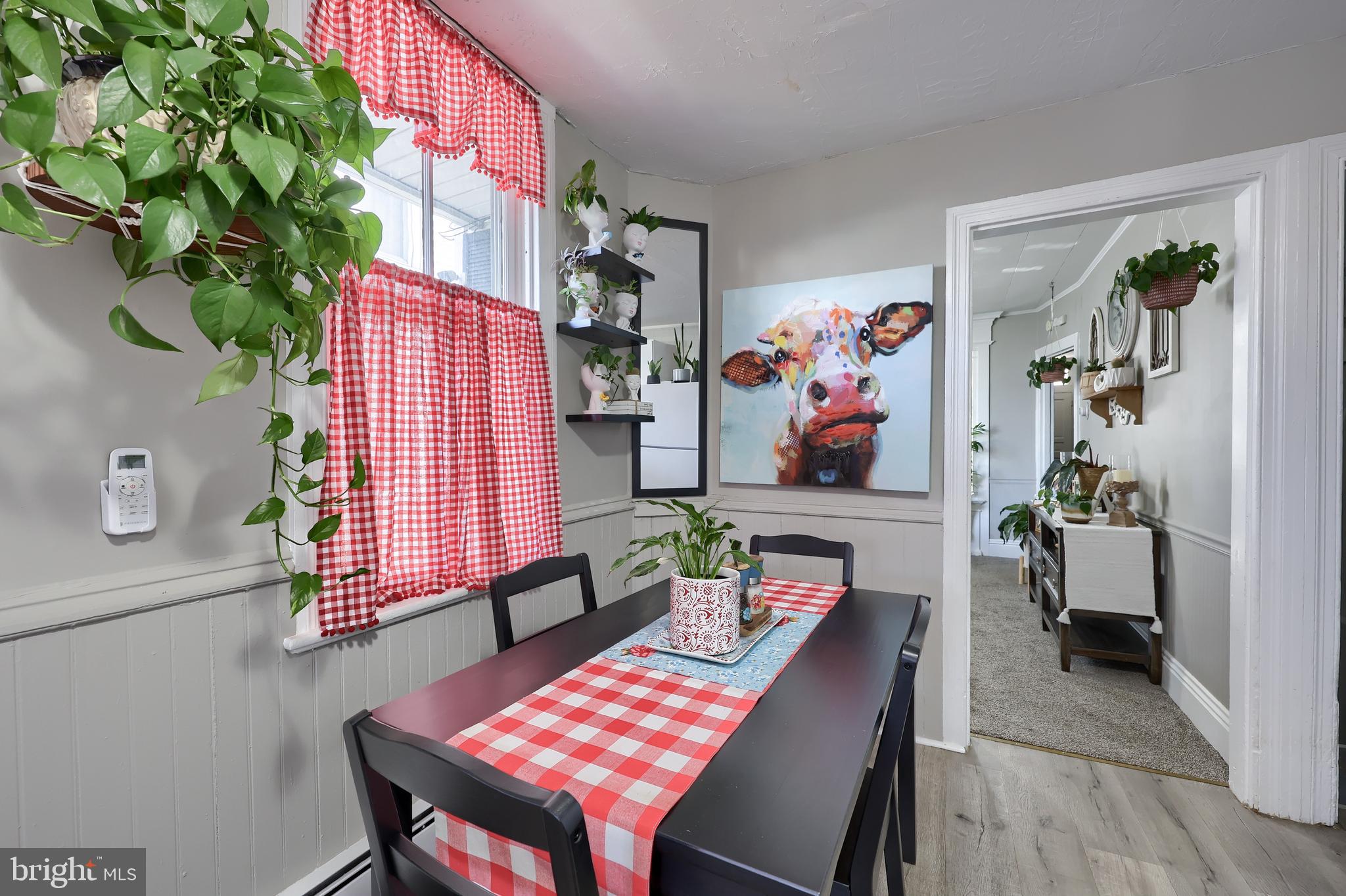857 East Princess Street York, PA 17403 - Photo 16 of 38 a living room with furniture and a potted plant