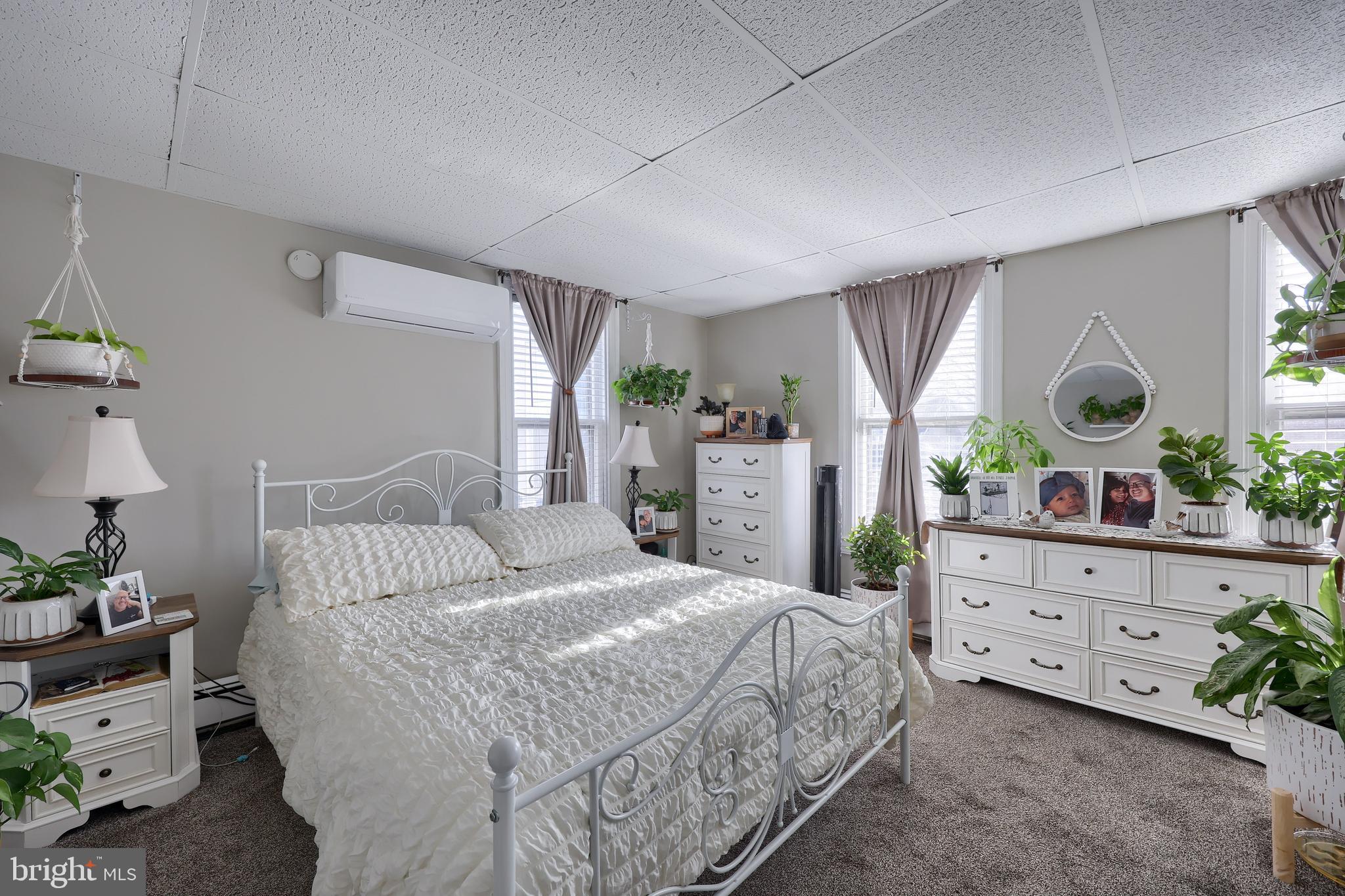 857 East Princess Street York, PA 17403 - Photo 24 of 38 a bedroom with a bed and a dresser