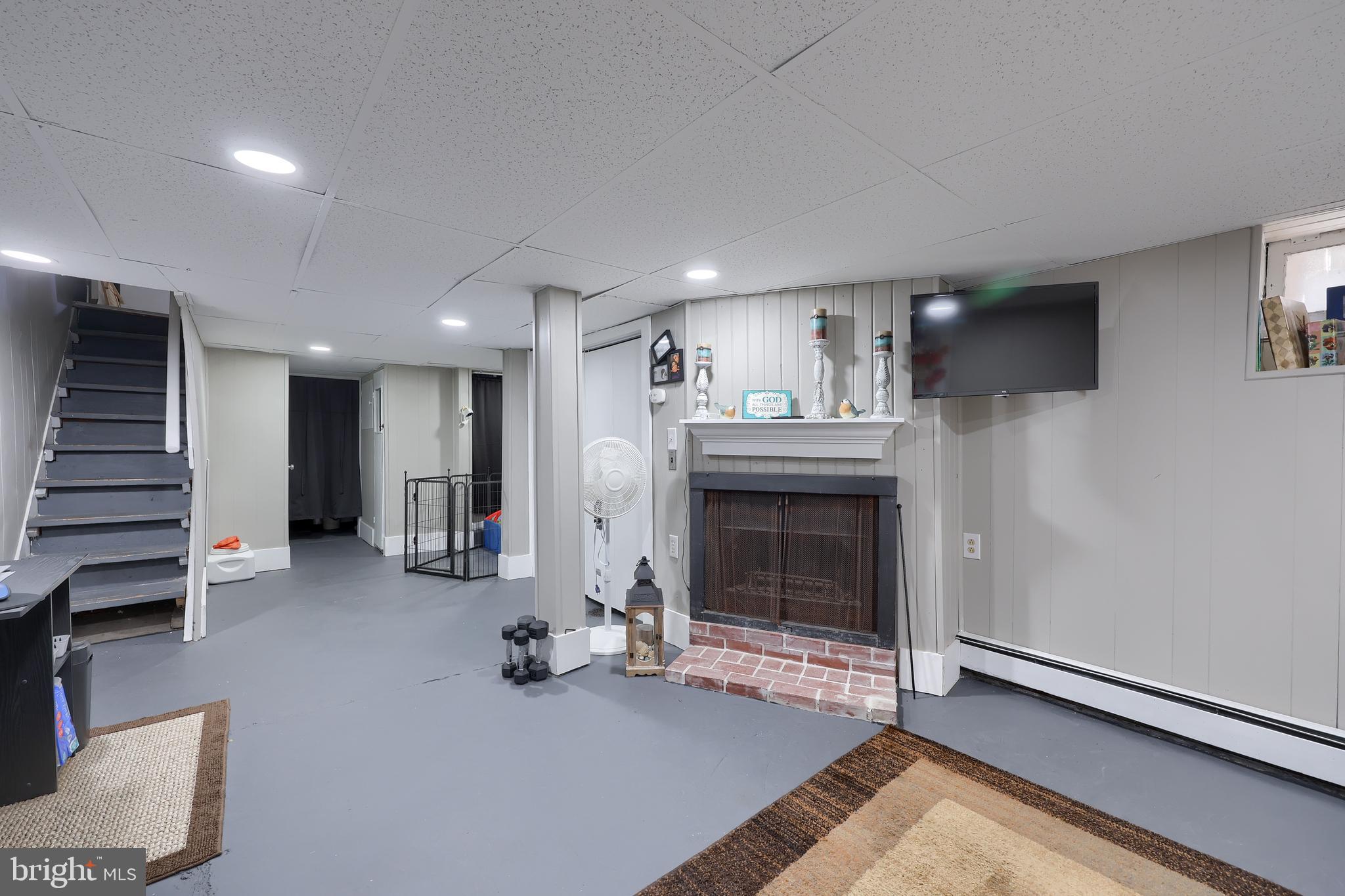857 East Princess Street York, PA 17403 - Photo 27 of 38 a view of a livingroom with a fireplace and window