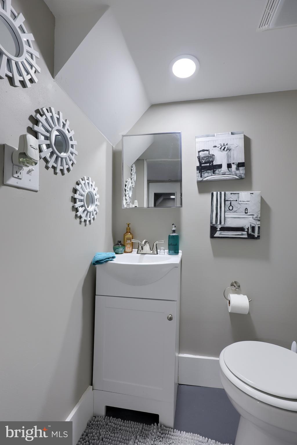 857 East Princess Street York, PA 17403 - Photo 29 of 38 a bathroom with a toilet sink and mirror