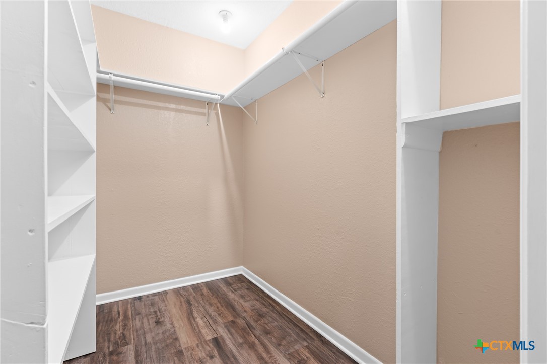 607 South Nancy Ann Street Hamilton, TX 76531 - Photo 13 of 26 a view of small space with wooden floor