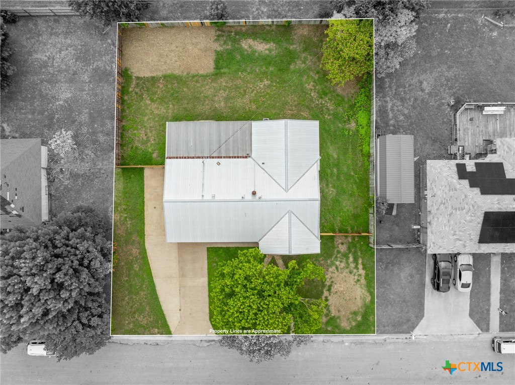 607 South Nancy Ann Street Hamilton, TX 76531 - Photo 25 of 26 front view of a house with a small yard