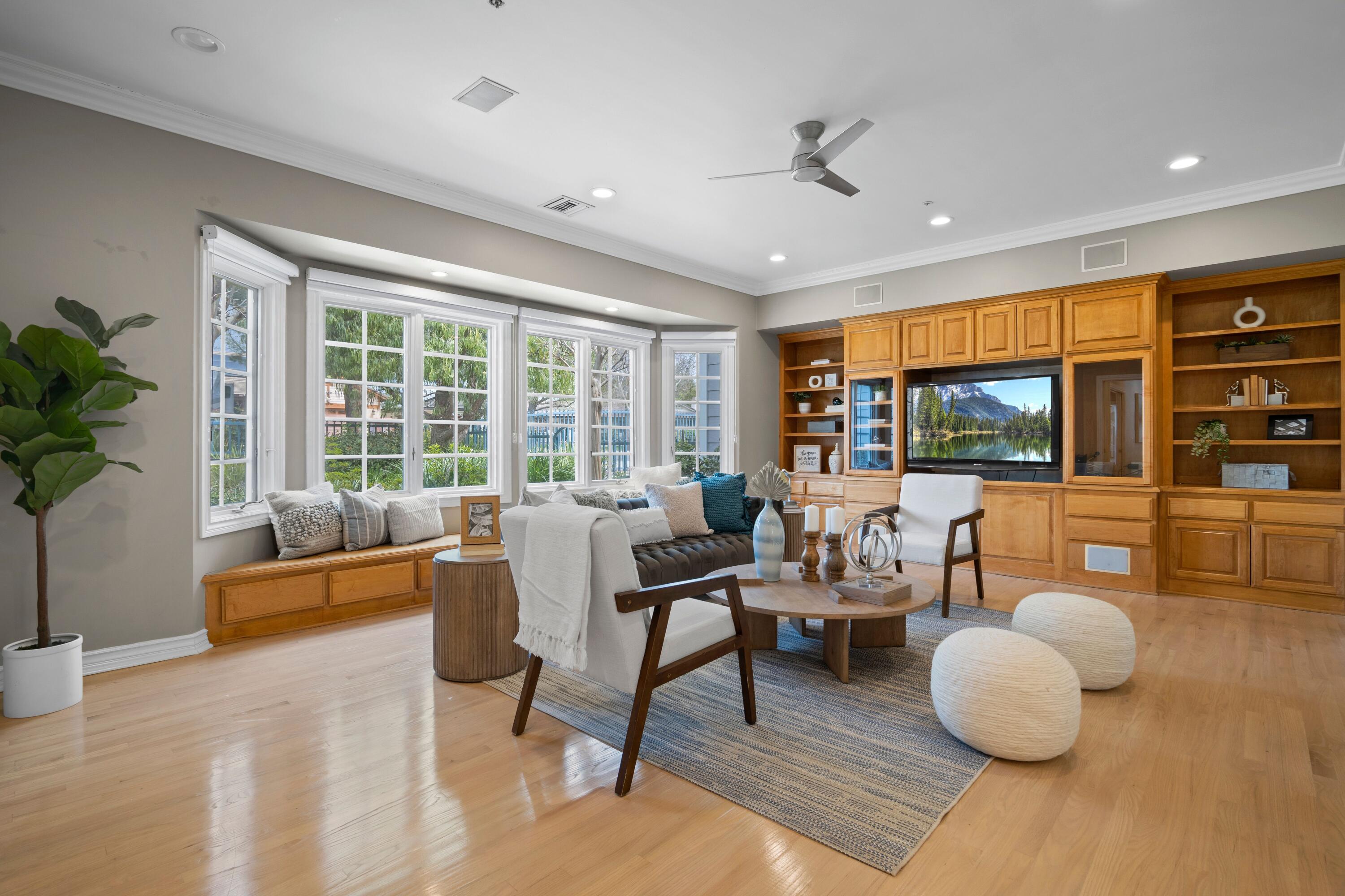 24335 Arcadia Street Newhall, CA 91321 - Photo 14 of 50 a living room with furniture and a flat screen tv