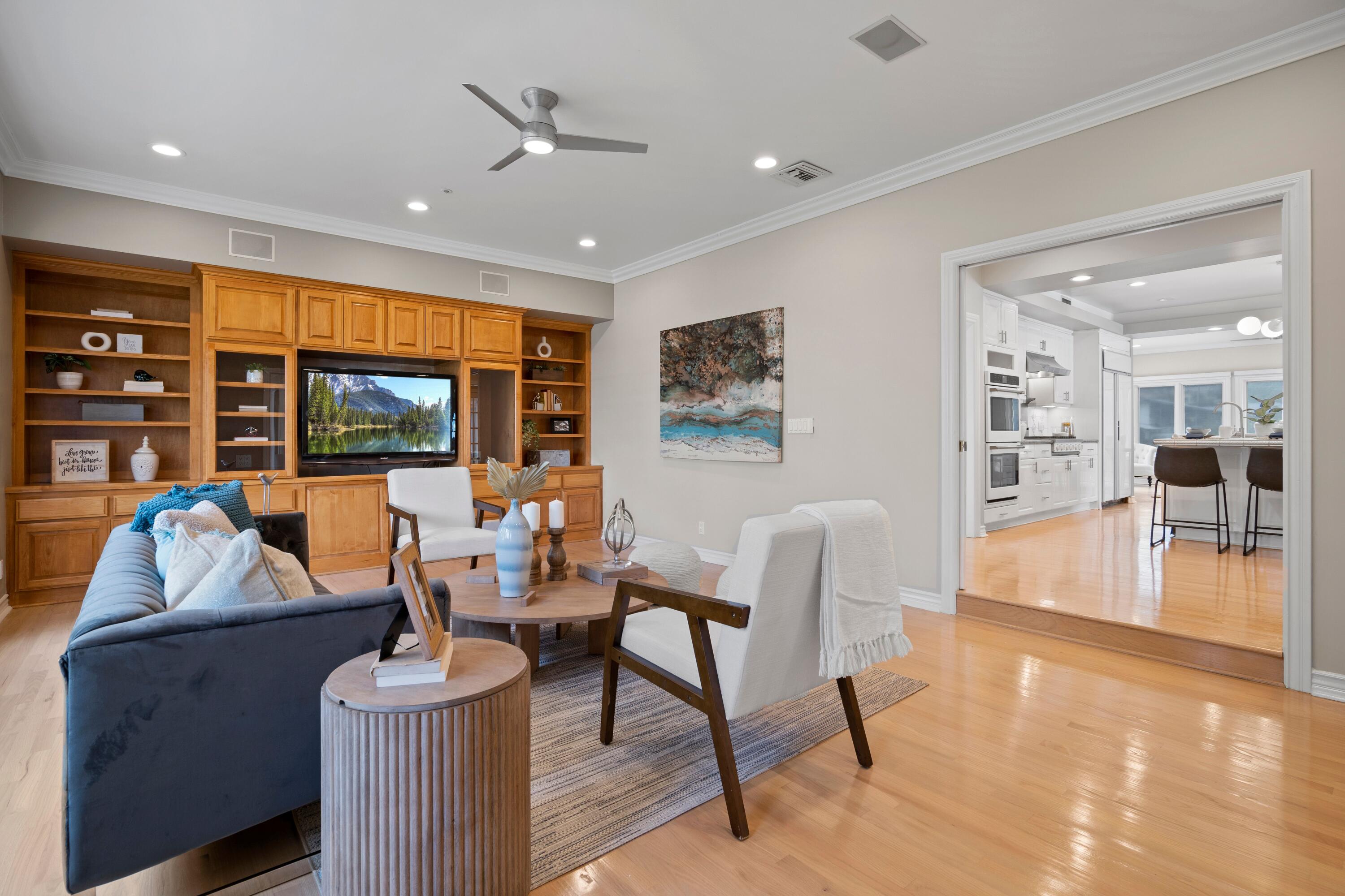 24335 Arcadia Street Newhall, CA 91321 - Photo 16 of 50 a living room with furniture and a flat screen tv