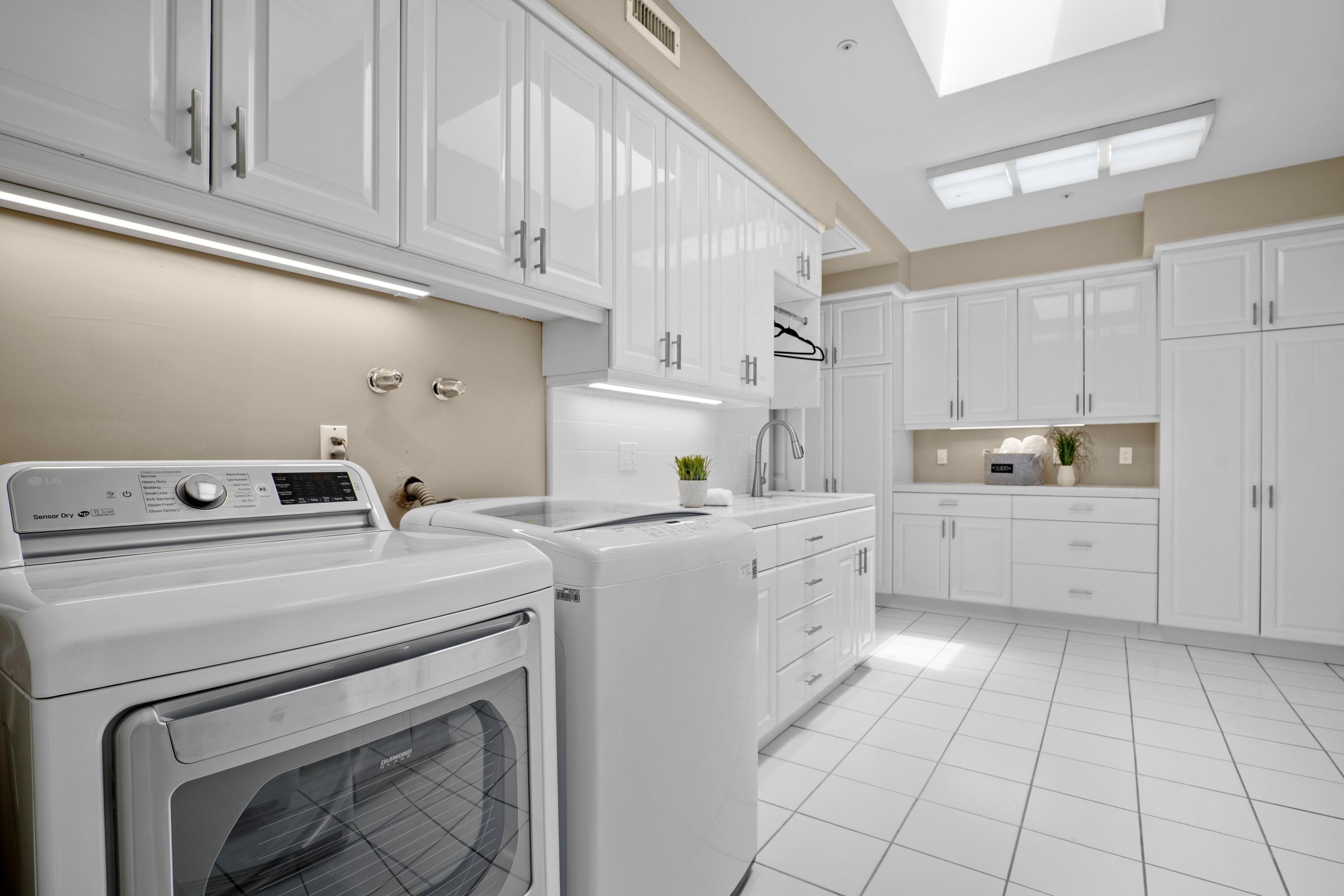 24335 Arcadia Street Newhall, CA 91321 - Photo 18 of 50 a kitchen with a stove top oven and cabinets