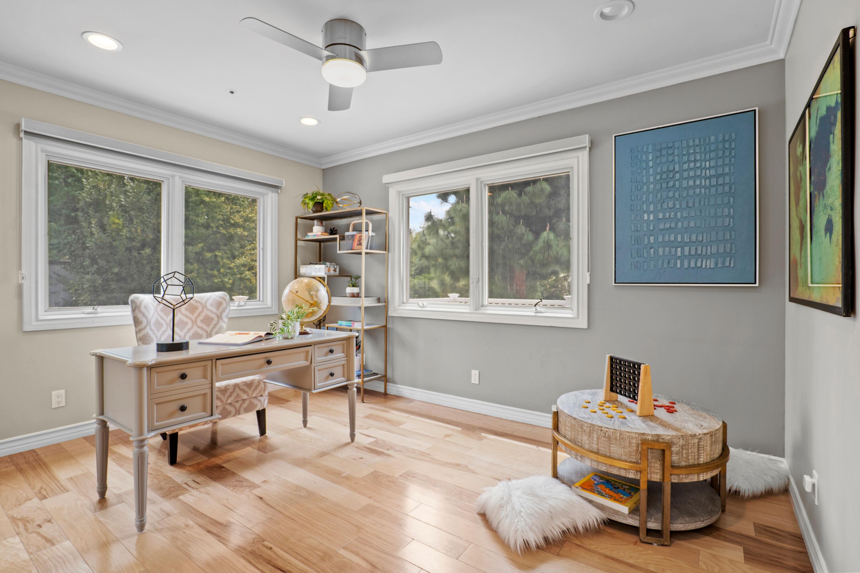 24335 Arcadia Street Newhall, CA 91321 - Photo 20 of 50 a living room with furniture and a large window