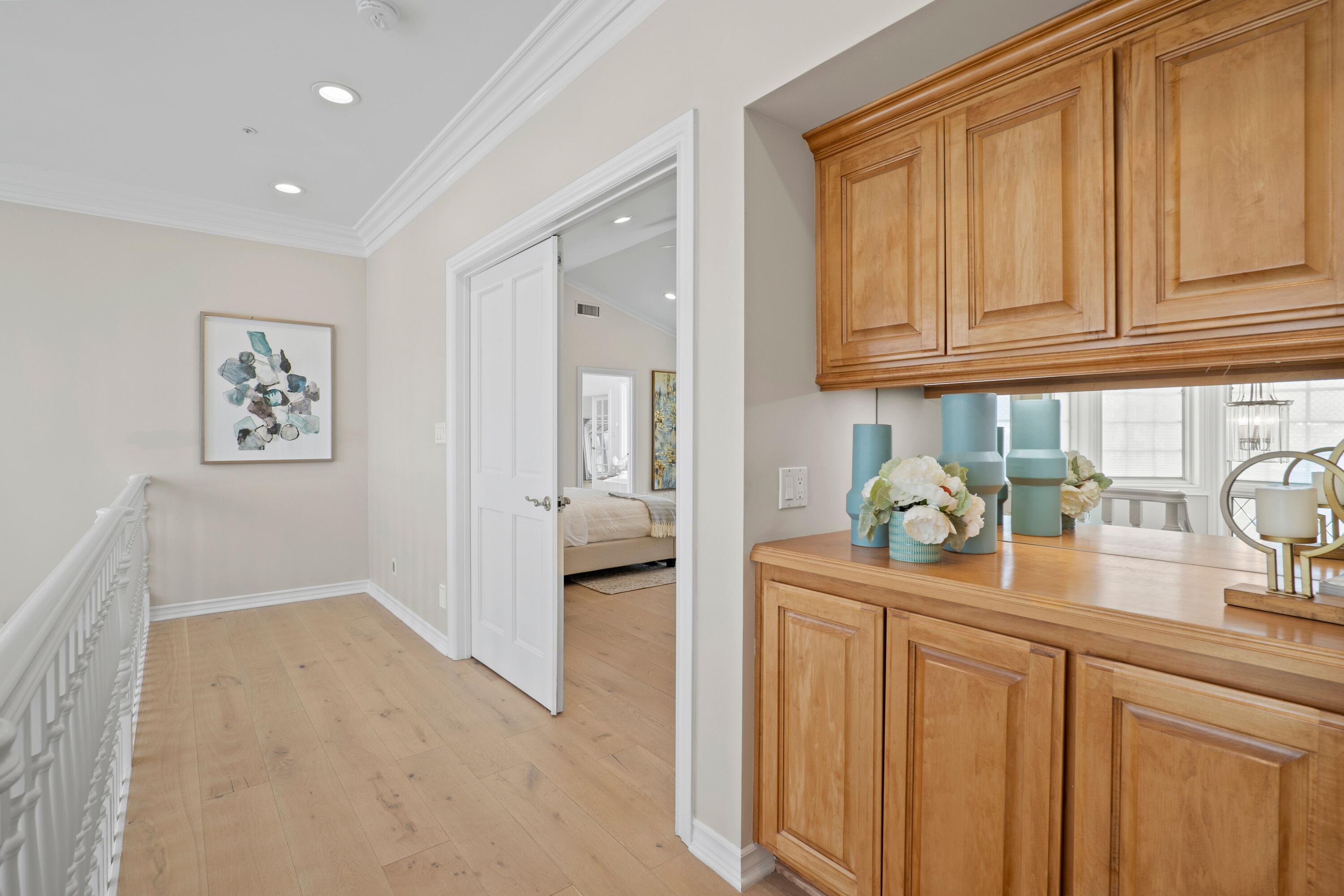 24335 Arcadia Street Newhall, CA 91321 - Photo 21 of 50 a hallway with natural light