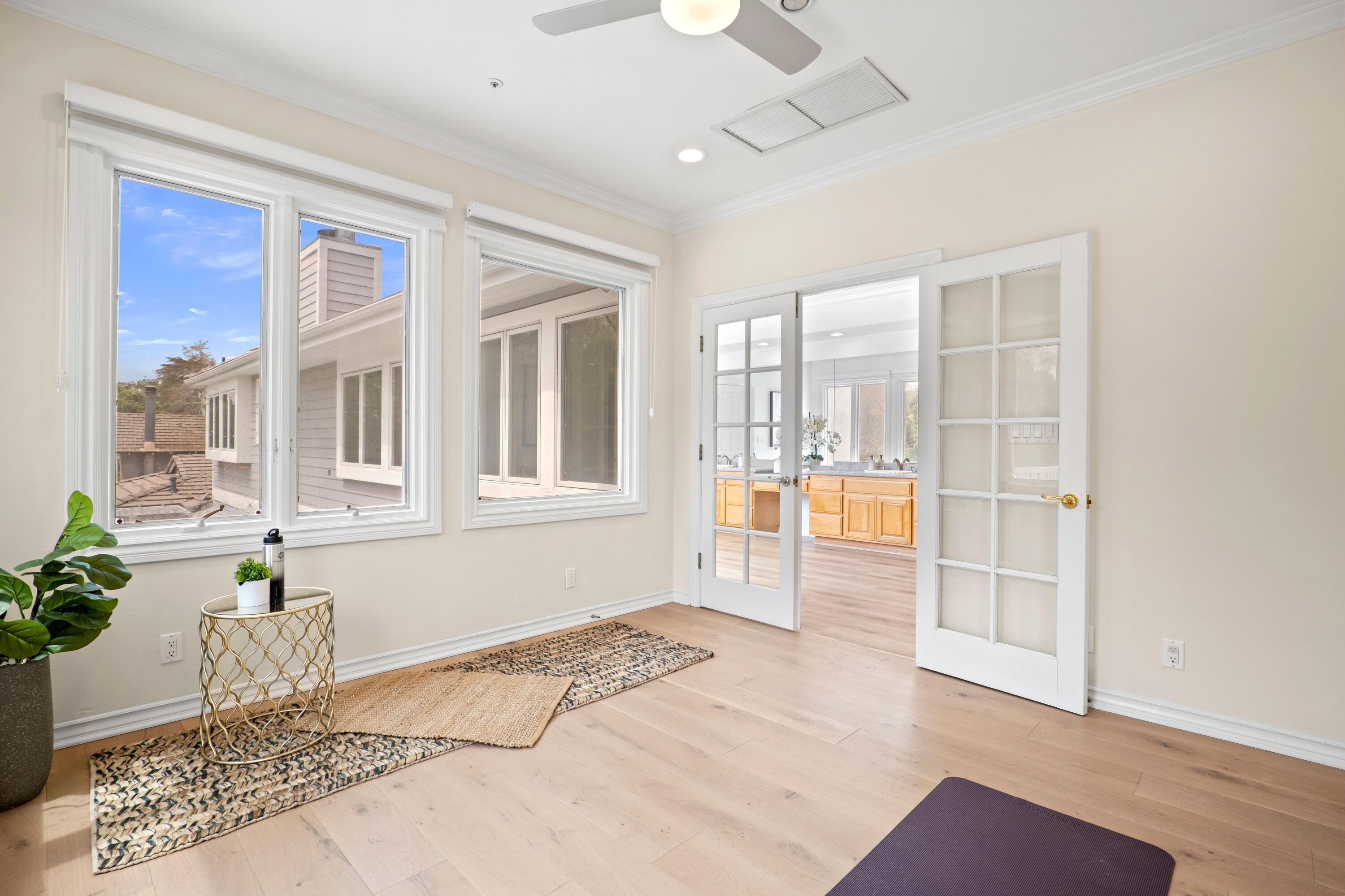24335 Arcadia Street Newhall, CA 91321 - Photo 29 of 50 a view of an empty room with wooden floor and a window