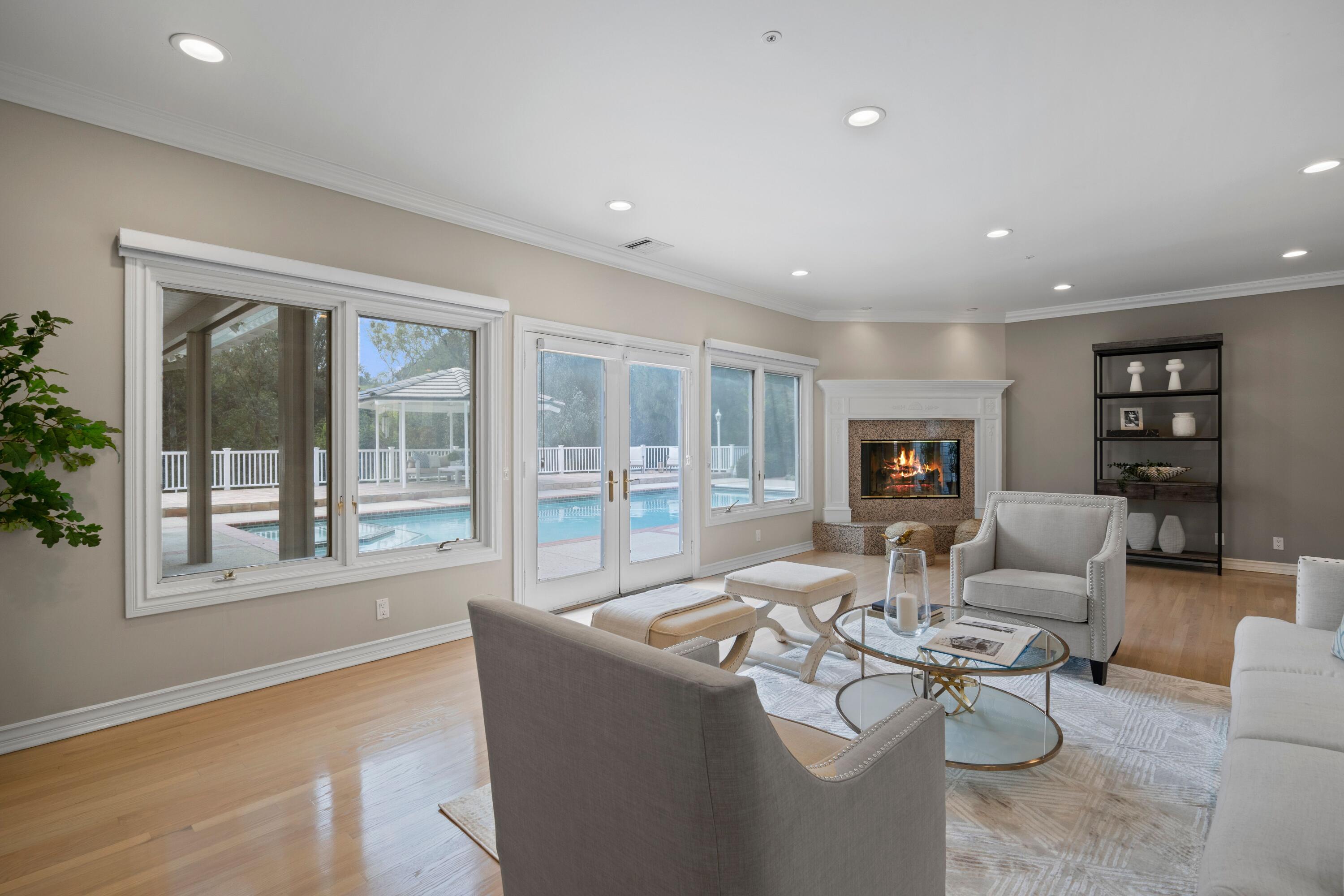 24335 Arcadia Street Newhall, CA 91321 - Photo 3 of 50 a living room with furniture and a flat screen tv