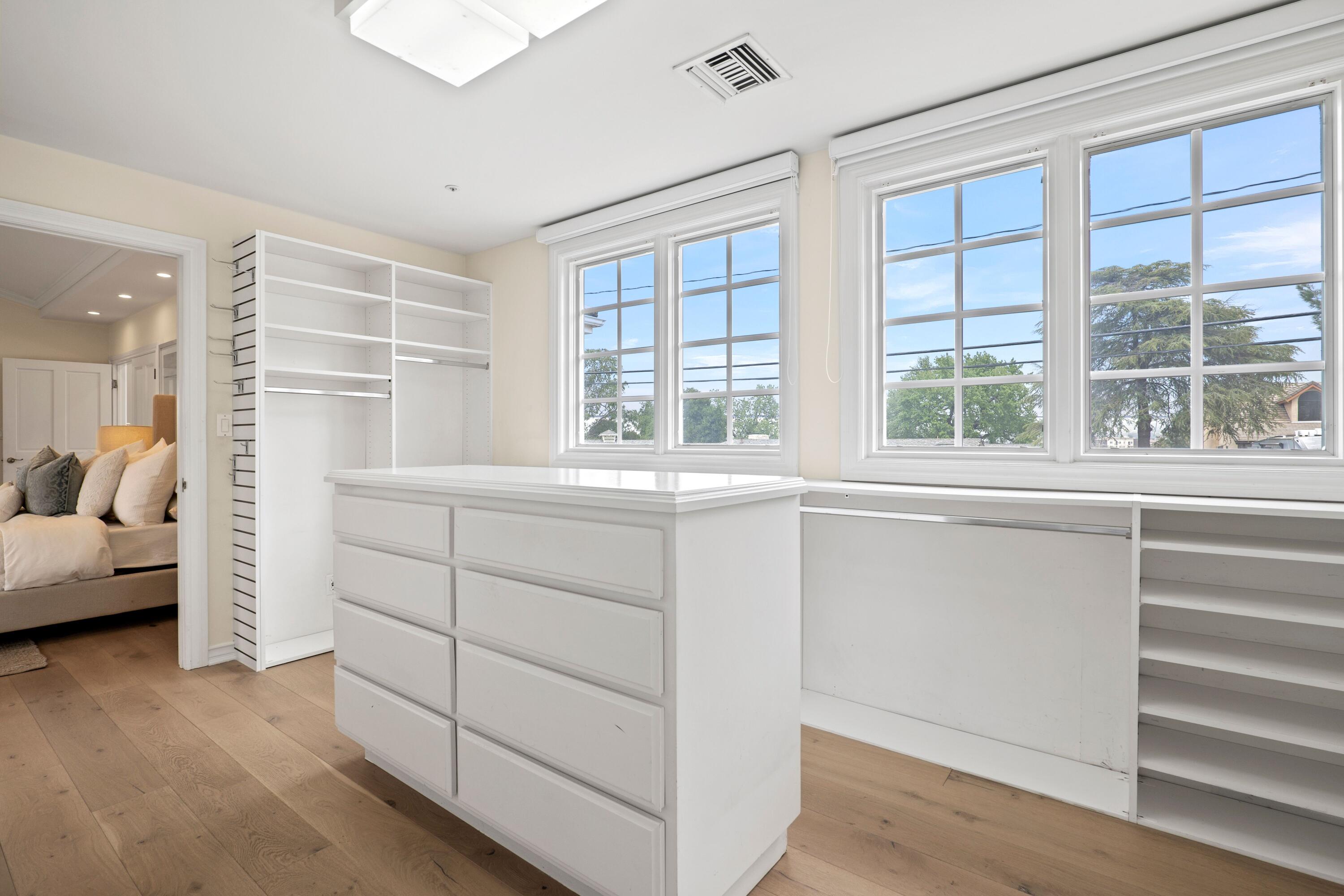 24335 Arcadia Street Newhall, CA 91321 - Photo 31 of 50 a room with a bed and a large window