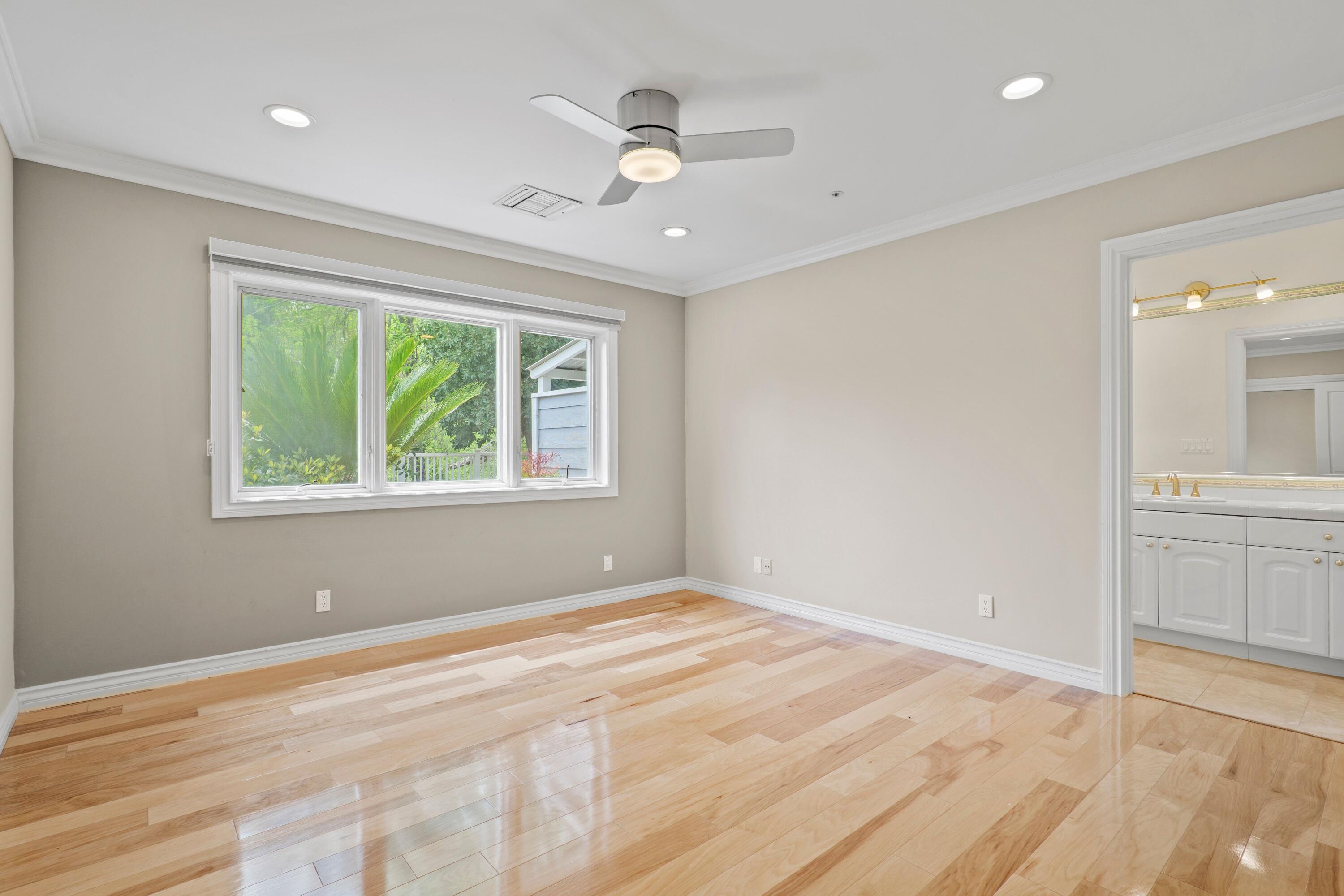 24335 Arcadia Street Newhall, CA 91321 - Photo 35 of 50 a view of empty room with wooden floor and fan