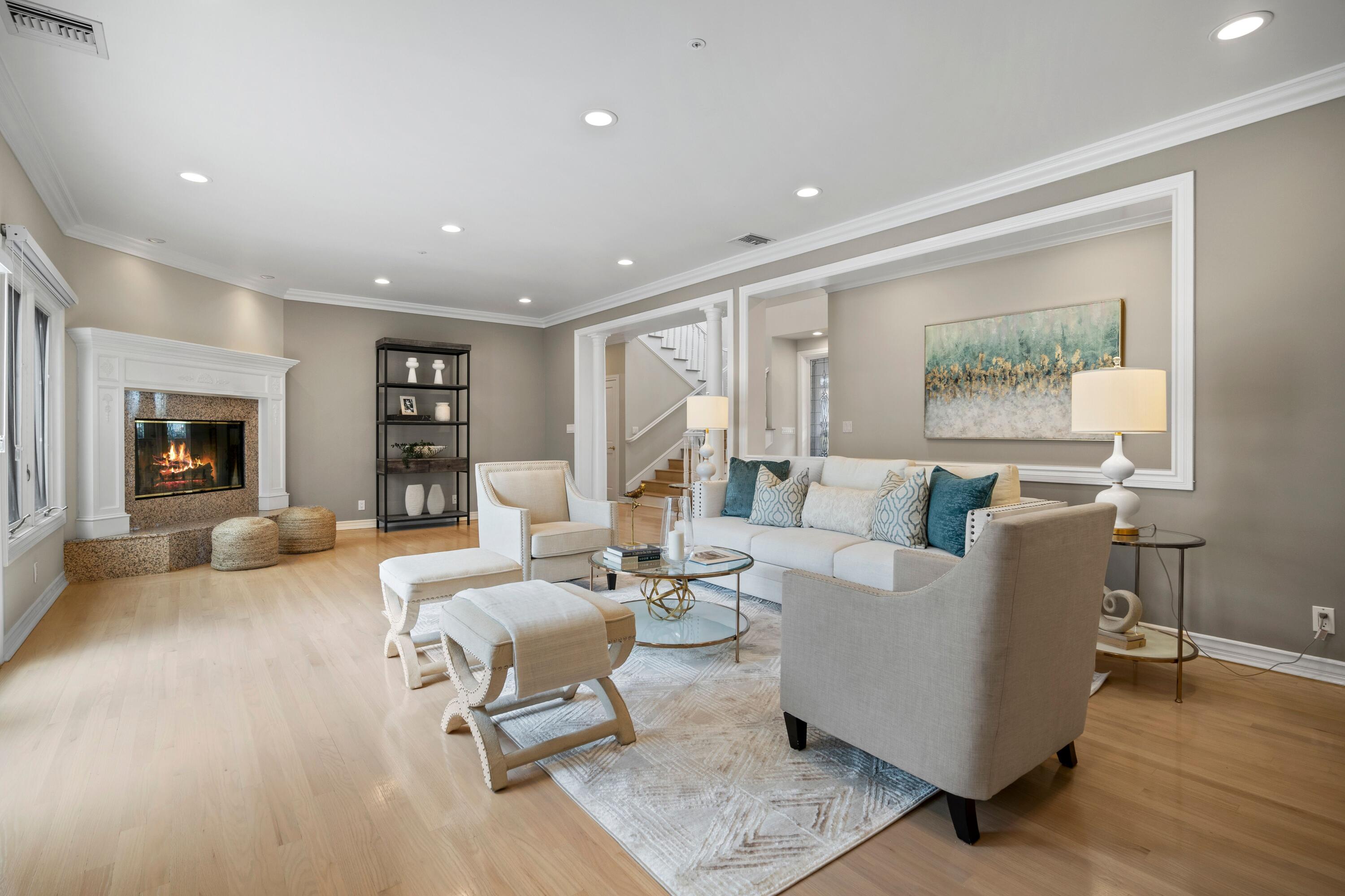24335 Arcadia Street Newhall, CA 91321 - Photo 4 of 50 a living room with furniture and a wooden floor
