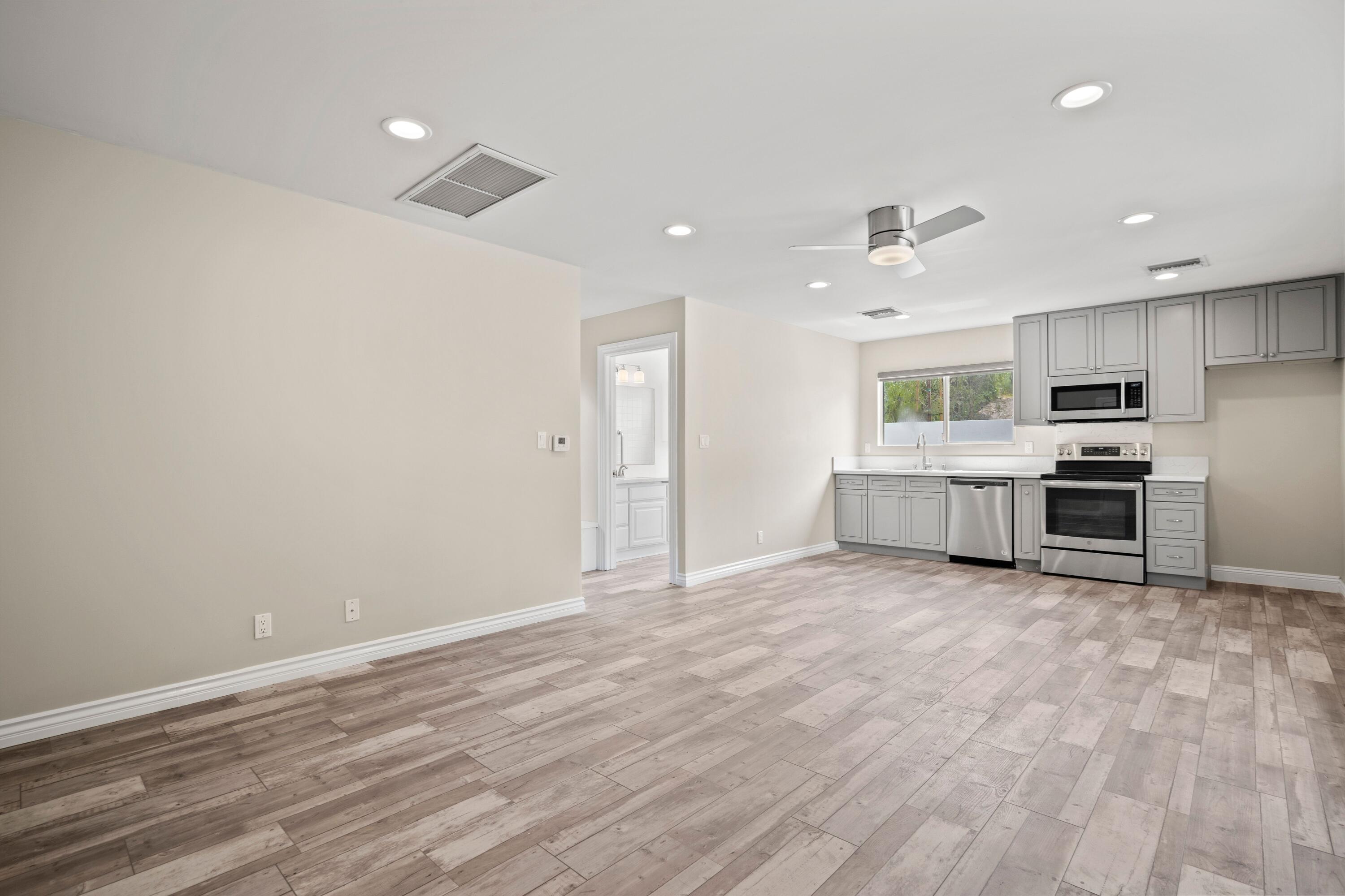 24335 Arcadia Street Newhall, CA 91321 - Photo 41 of 50 a view of kitchen with sink and cabinet