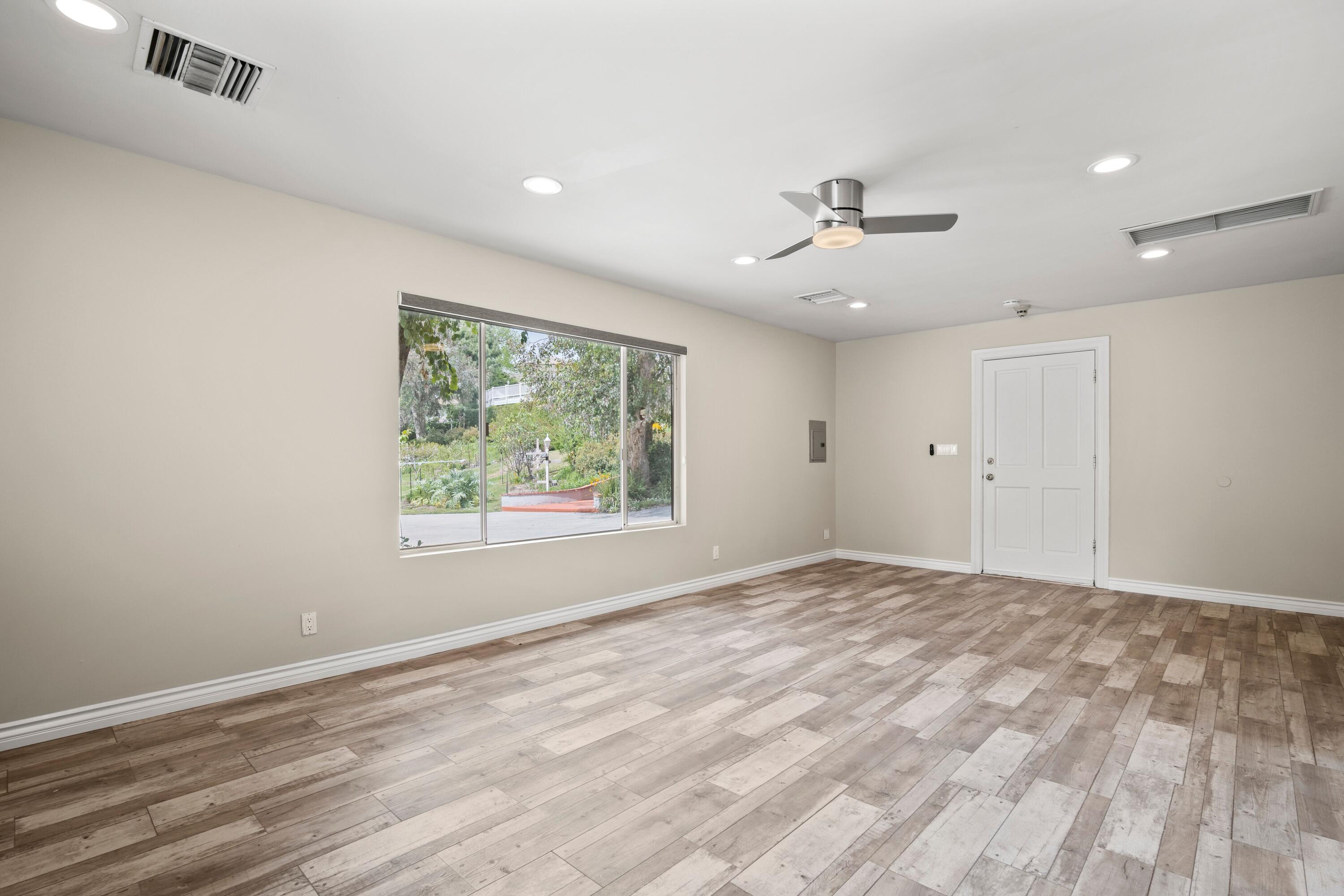 24335 Arcadia Street Newhall, CA 91321 - Photo 42 of 50 a view of an empty room with a window