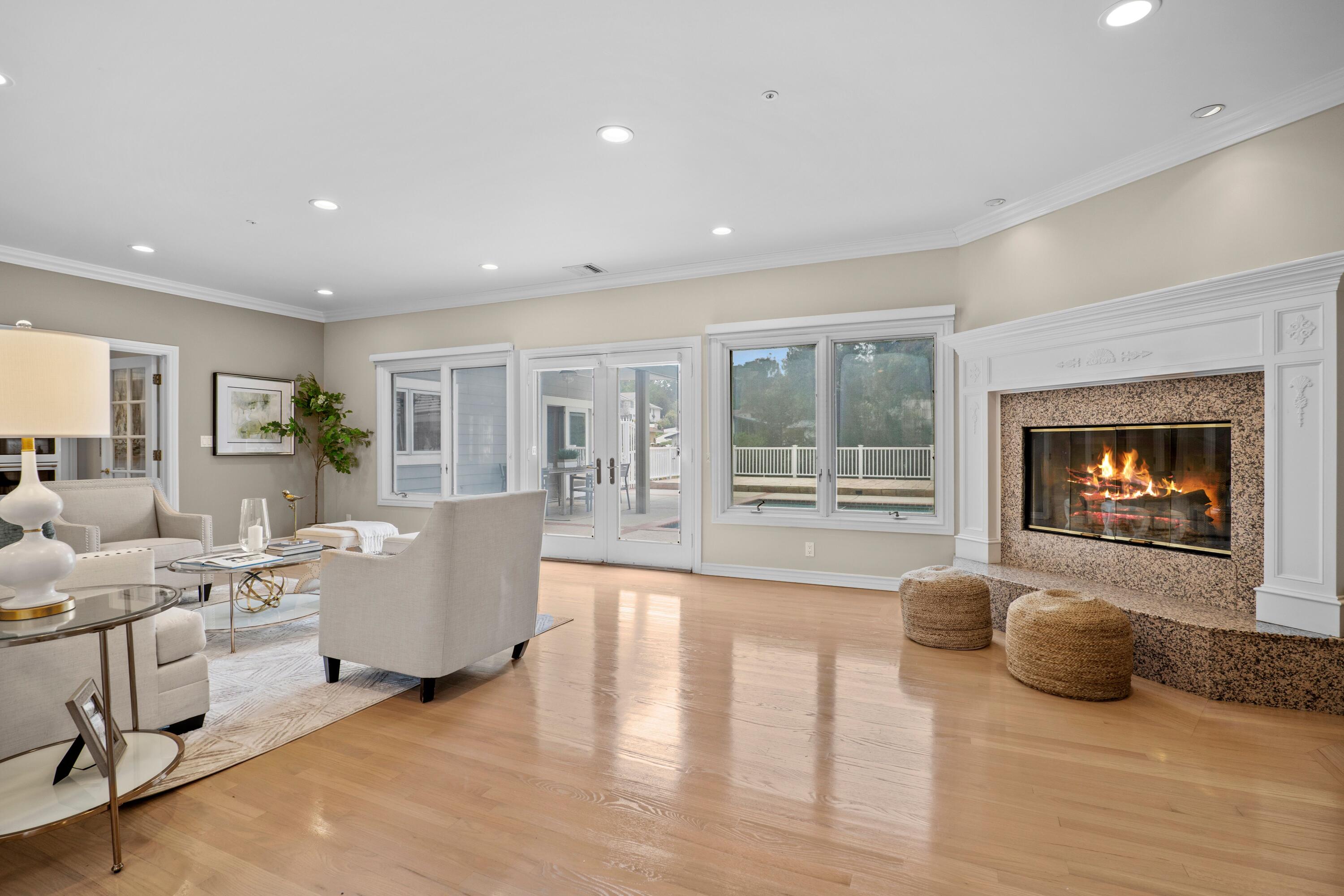 24335 Arcadia Street Newhall, CA 91321 - Photo 5 of 50 a living room with furniture window and a fireplace