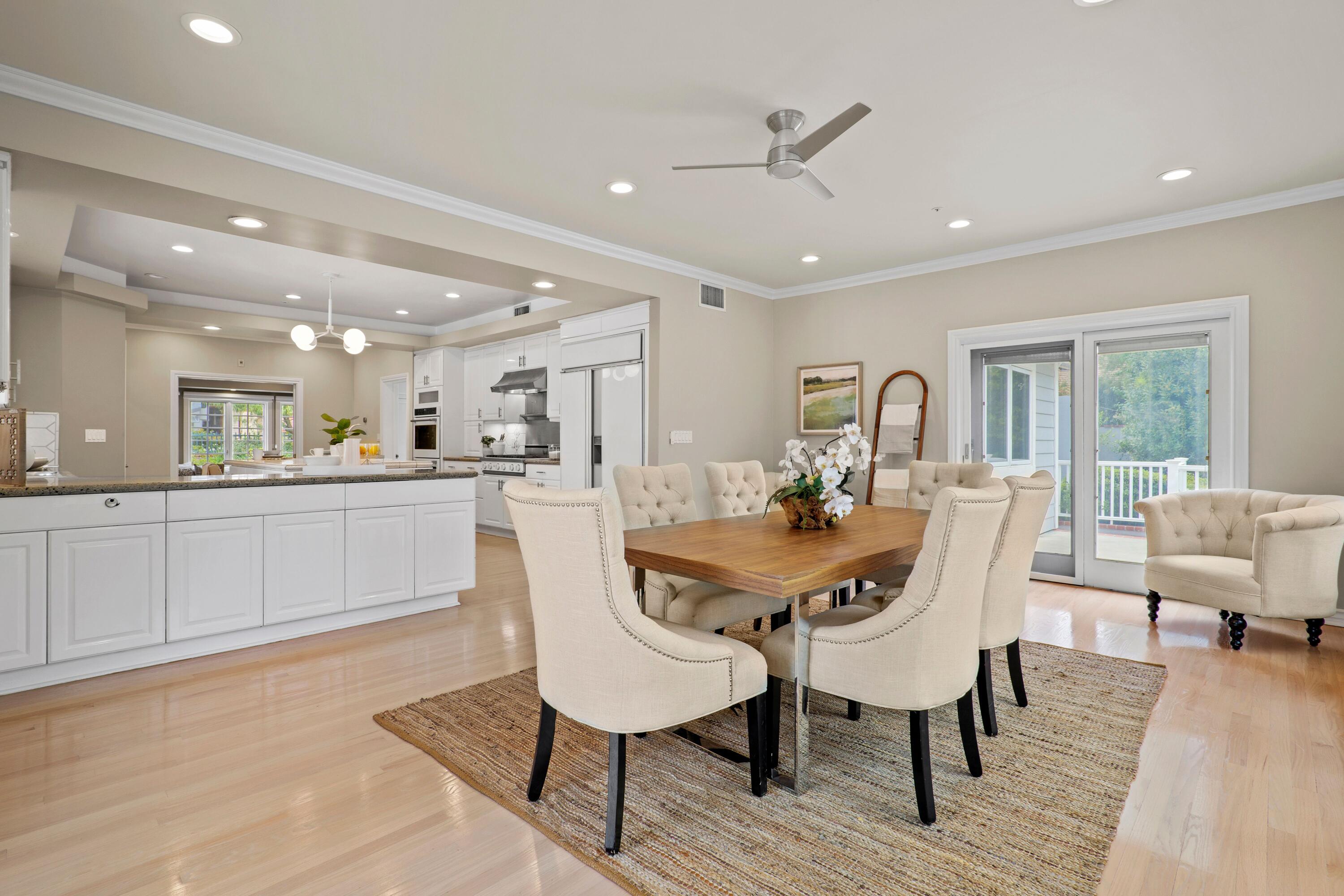 24335 Arcadia Street Newhall, CA 91321 - Photo 10 of 50 a view of a dining room with furniture and wooden floor