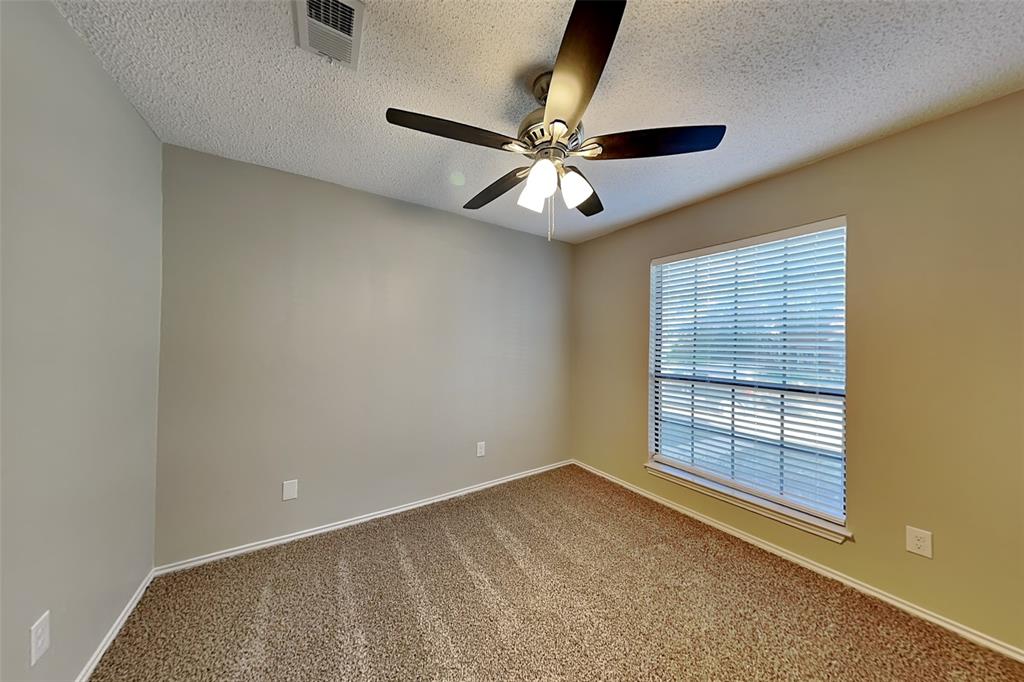 1602 Spring Street Allen, TX 75002 - Photo 14 of 20 a view of an empty room with a window