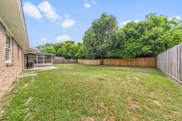 a view of outdoor space and yard