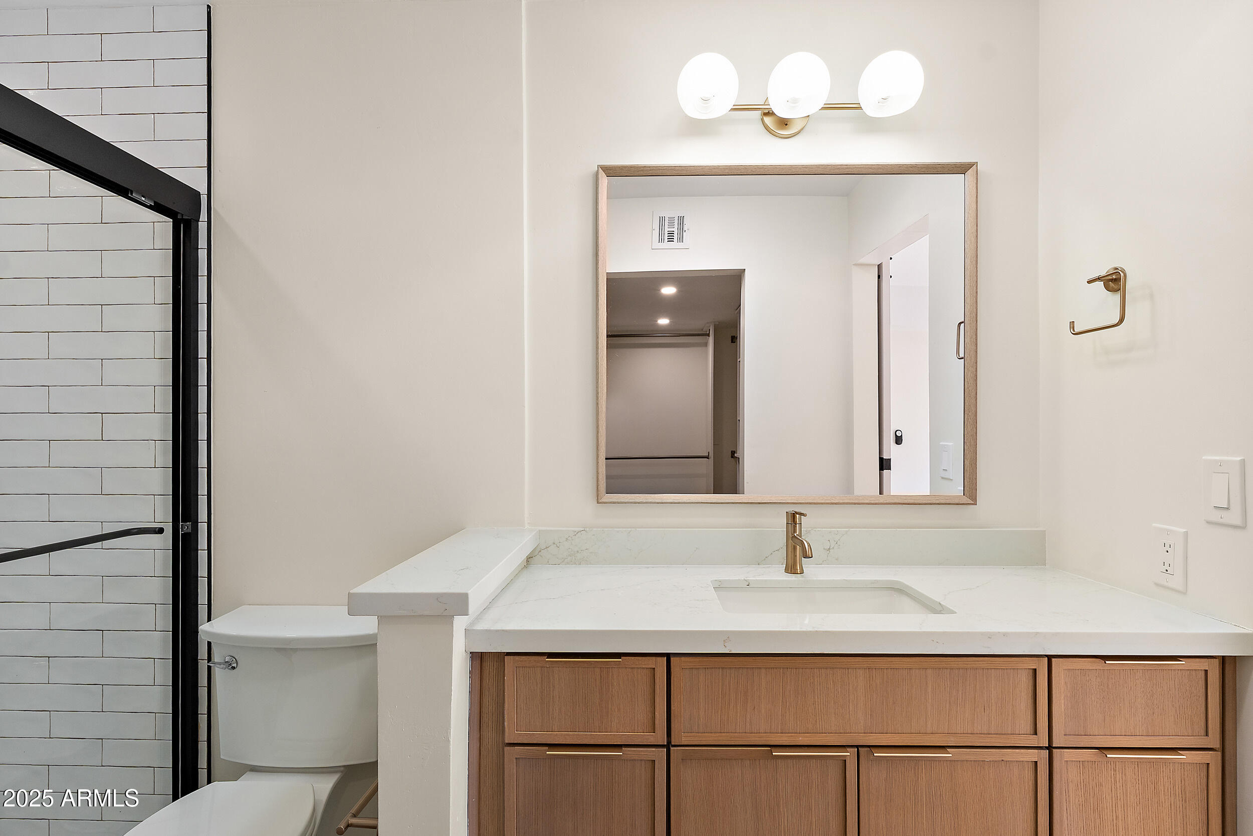 1319 East Susan Lane Tempe, AZ 85288 - Photo 15 of 23 a bathroom with a sink and a mirror