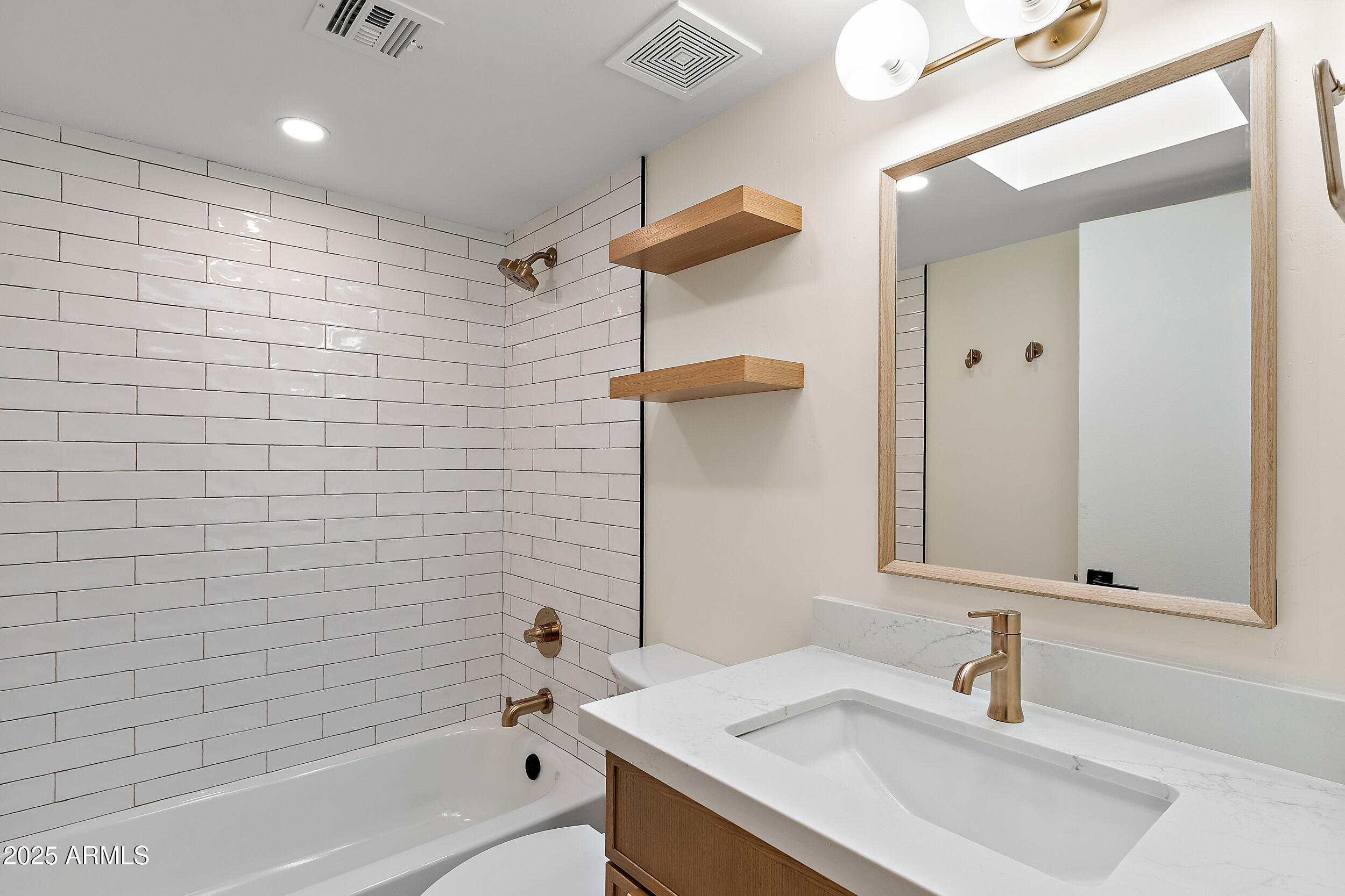 1319 East Susan Lane Tempe, AZ 85288 - Photo 16 of 23 a bathroom with a sink a toilet and shower