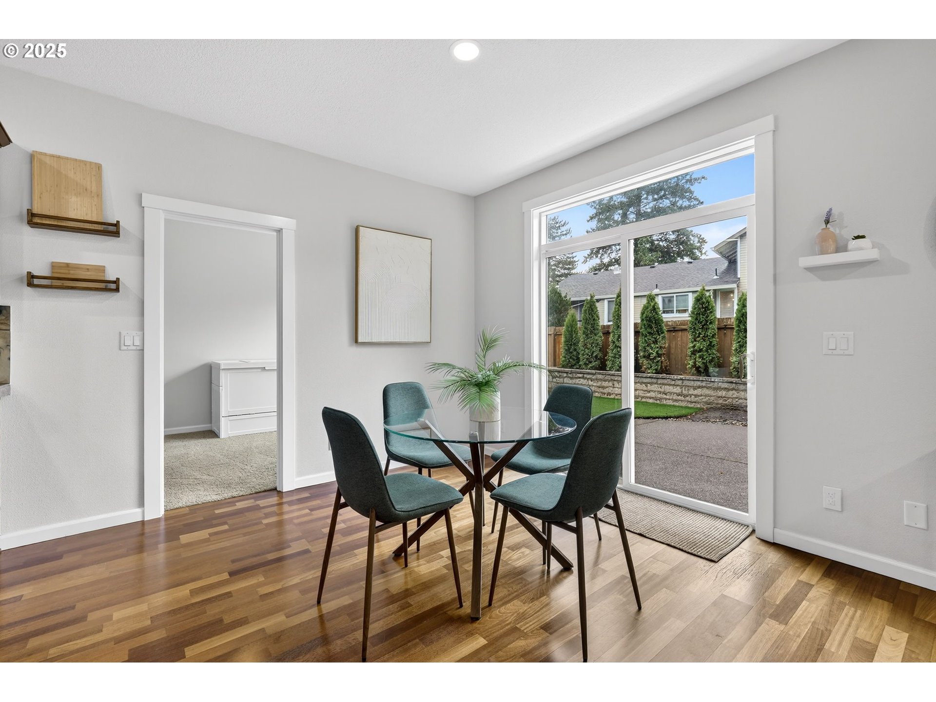 13140 Southwest Madison Court Beaverton, OR 97008 - Photo 13 of 48 a view of a dining room with furniture and wooden floor