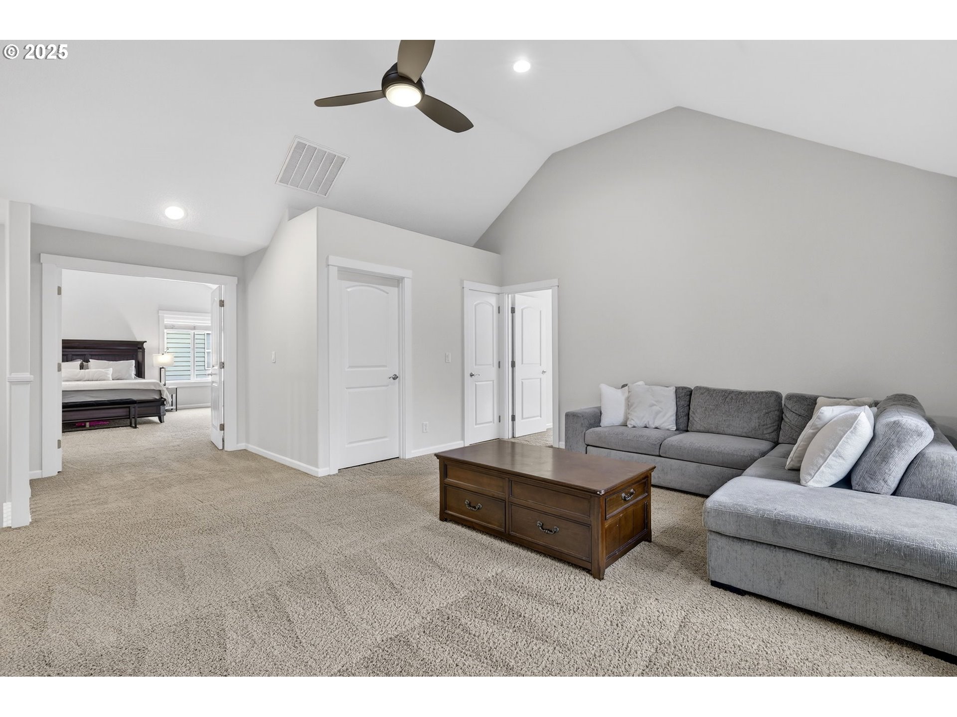 13140 Southwest Madison Court Beaverton, OR 97008 - Photo 23 of 48 a living room with furniture and a ceiling fan