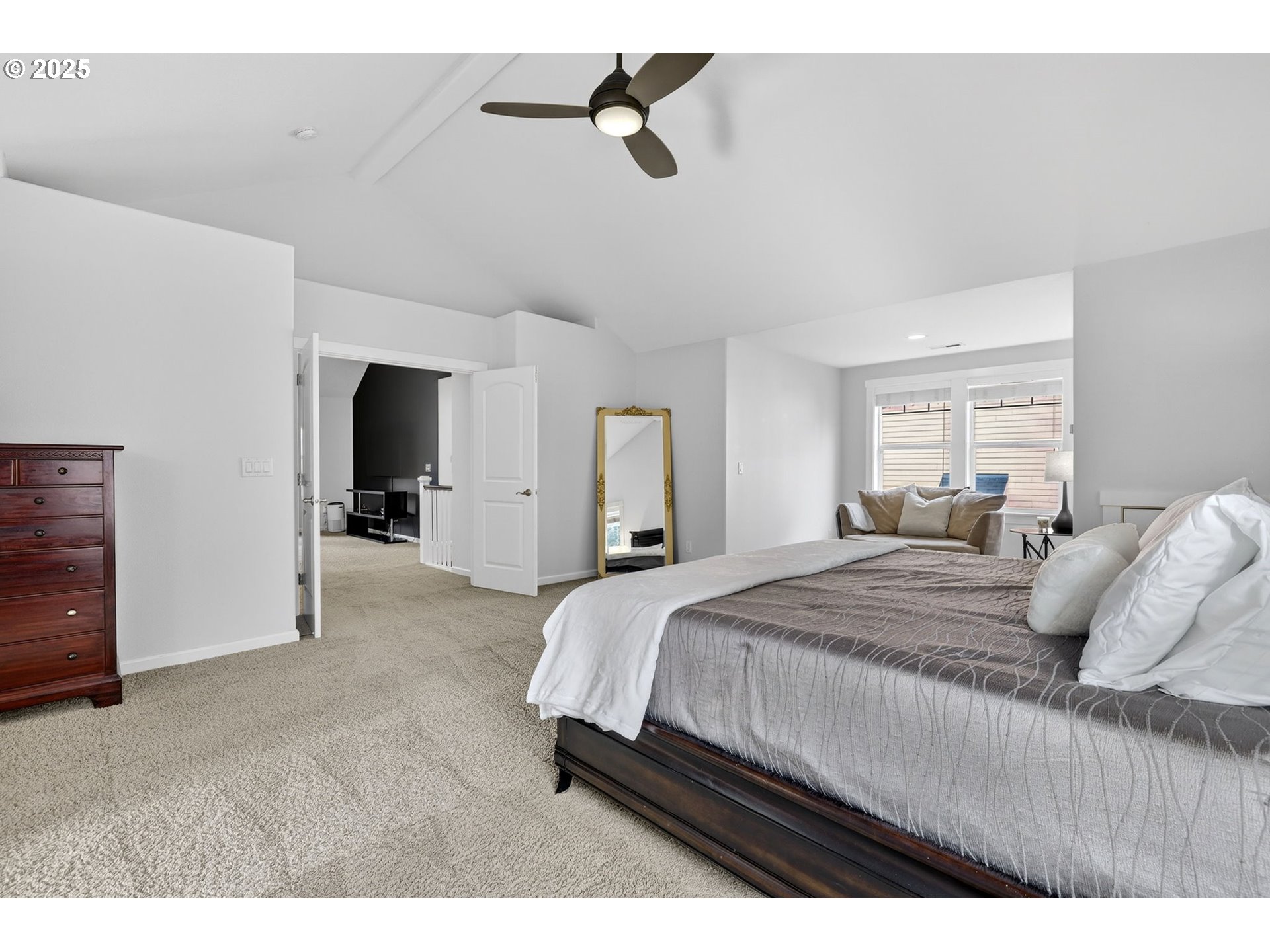 13140 Southwest Madison Court Beaverton, OR 97008 - Photo 27 of 48 a bedroom with a bed and dresser