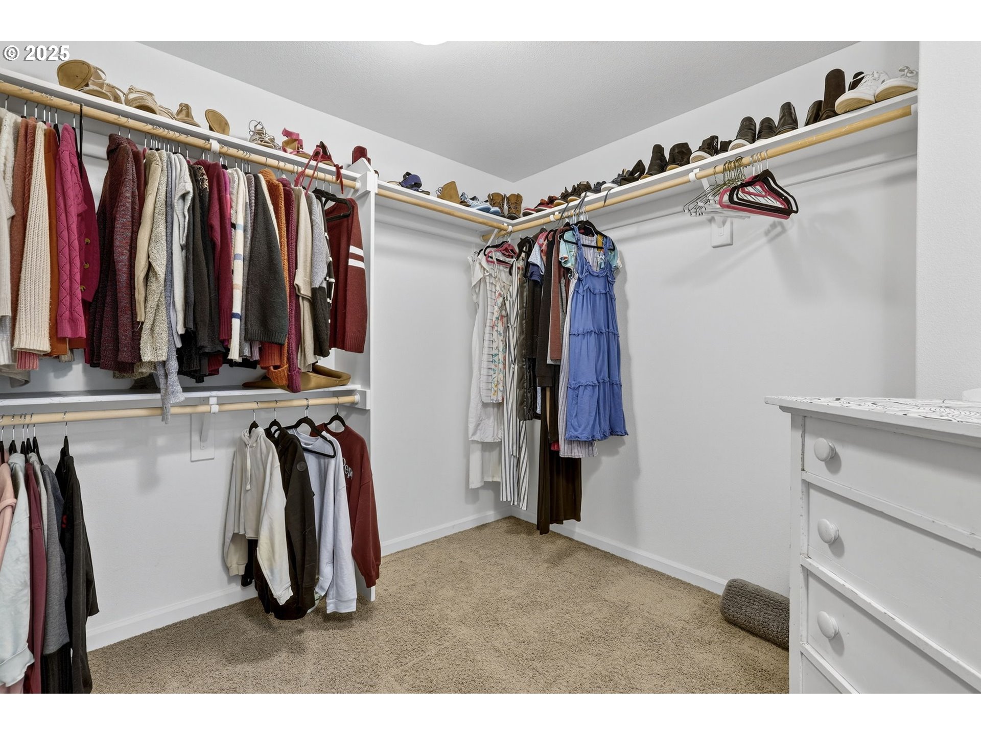 13140 Southwest Madison Court Beaverton, OR 97008 - Photo 32 of 48 a view of walk in closet with clothes
